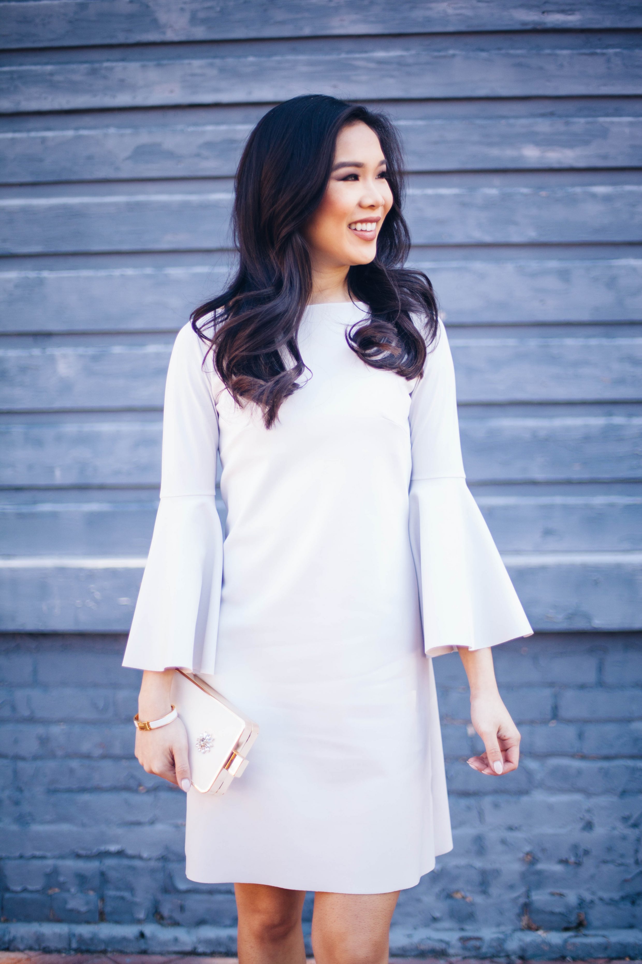 Blogger Hoang-Kim wears a La Petite Robe di Chiari Boni bell sleeve dress