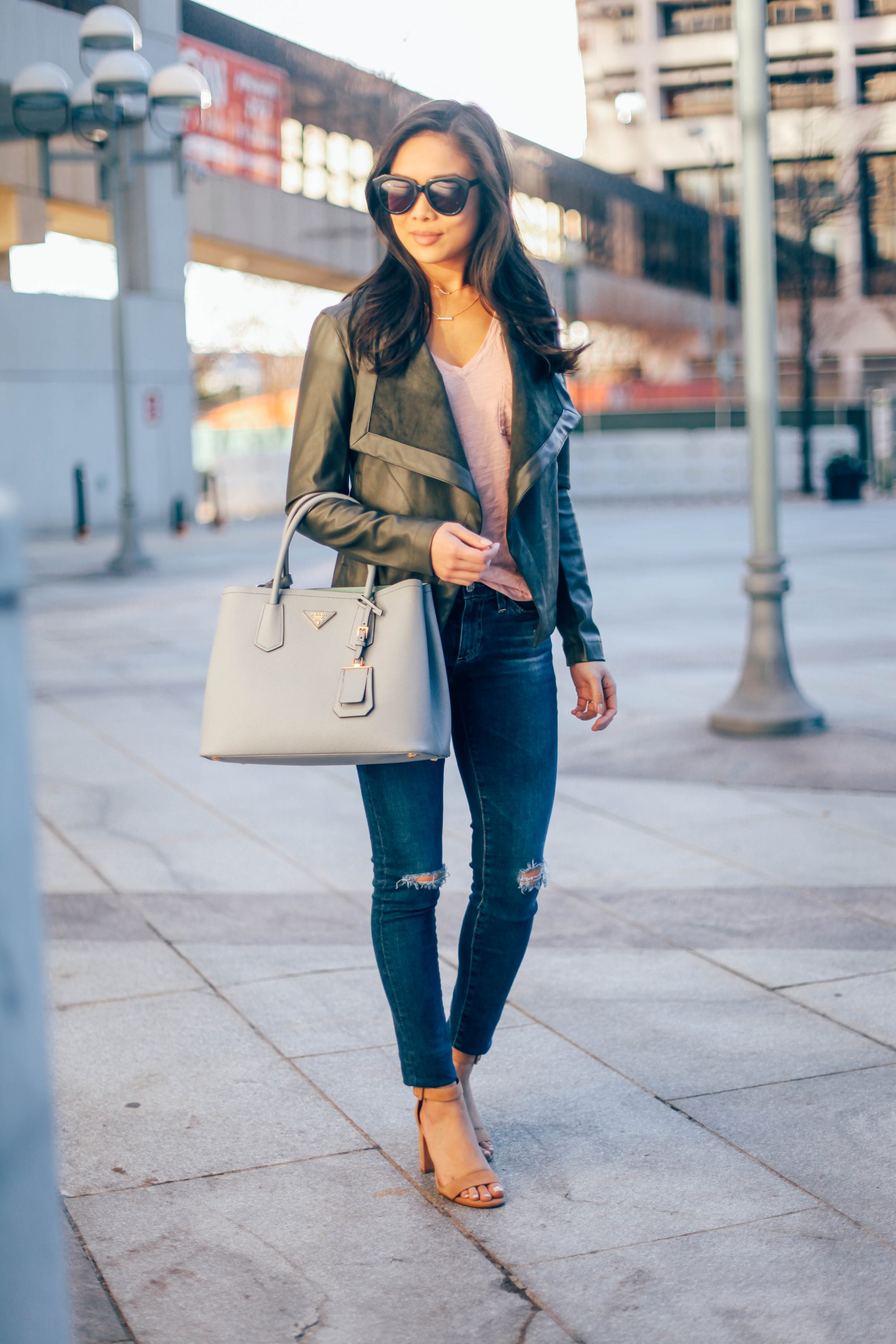 Blogger Hoang-Kim shares her tips for styling wardrobe basics for spring, including a leather jacket, tee and jeans
