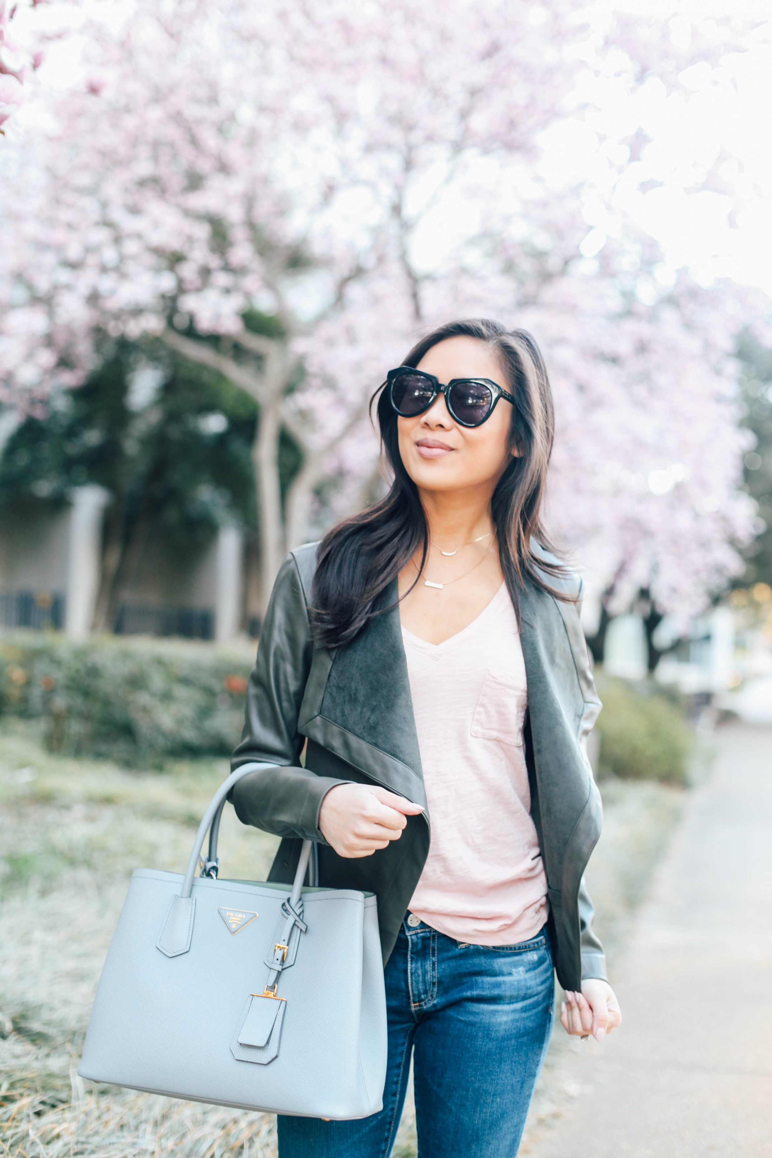 Blogger Hoang-Kim shares her tips for styling wardrobe basics for spring, including a leather jacket, tee and jeans