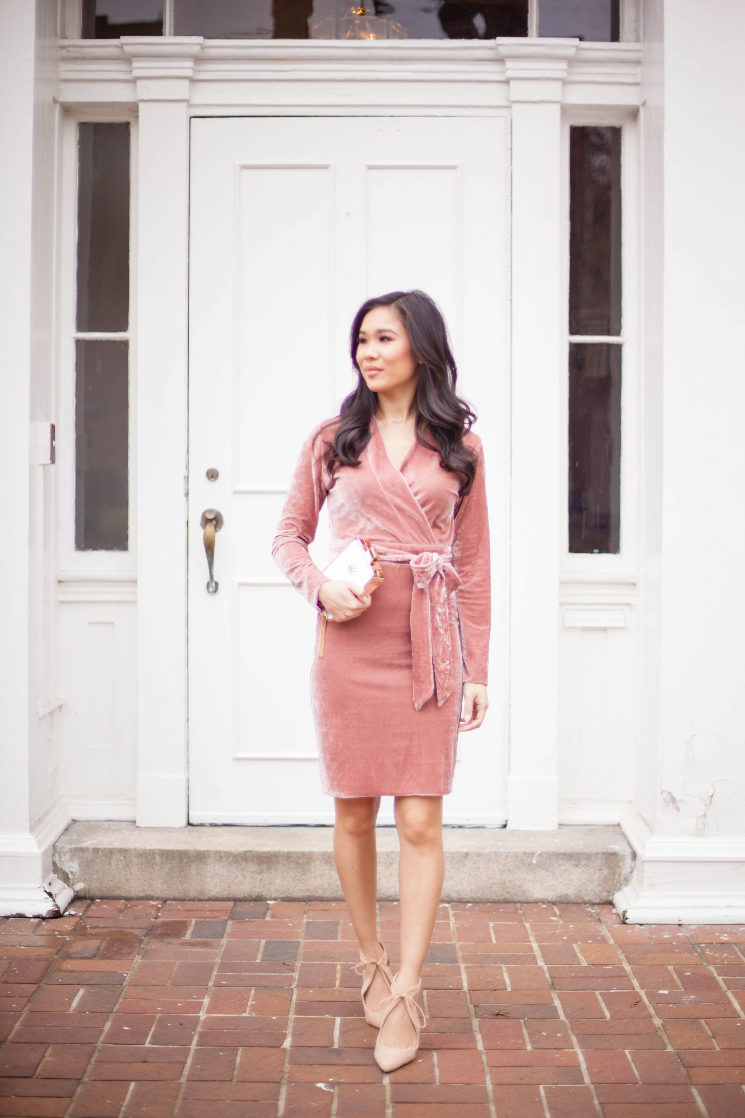 Blogger Hoang-Kim wears a velvet wrap dress from Chicwish for Valentine's Day
