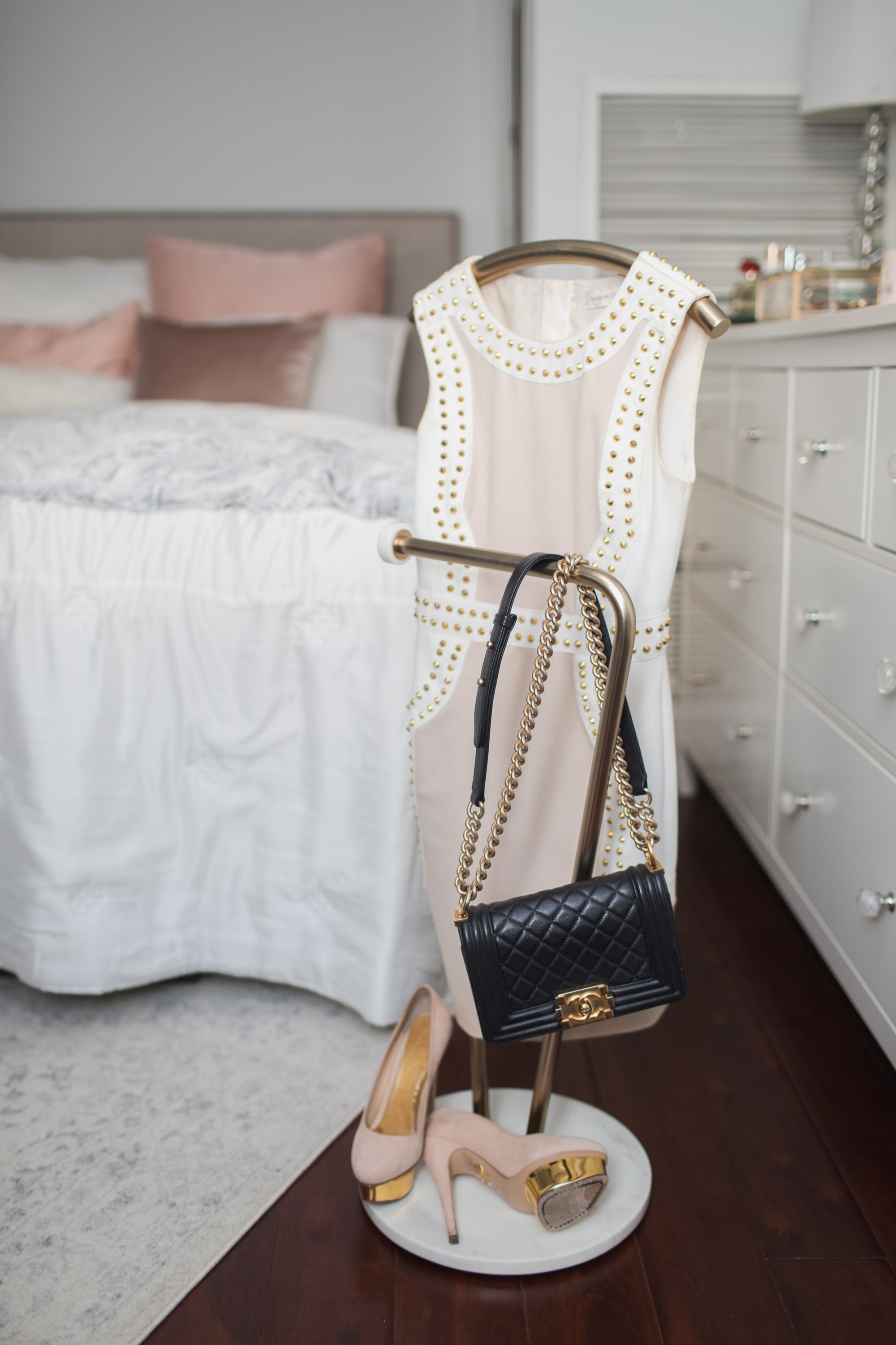 Marble valet stand with studded dress, Chanel Boy bag and Charlotte Olympia heels