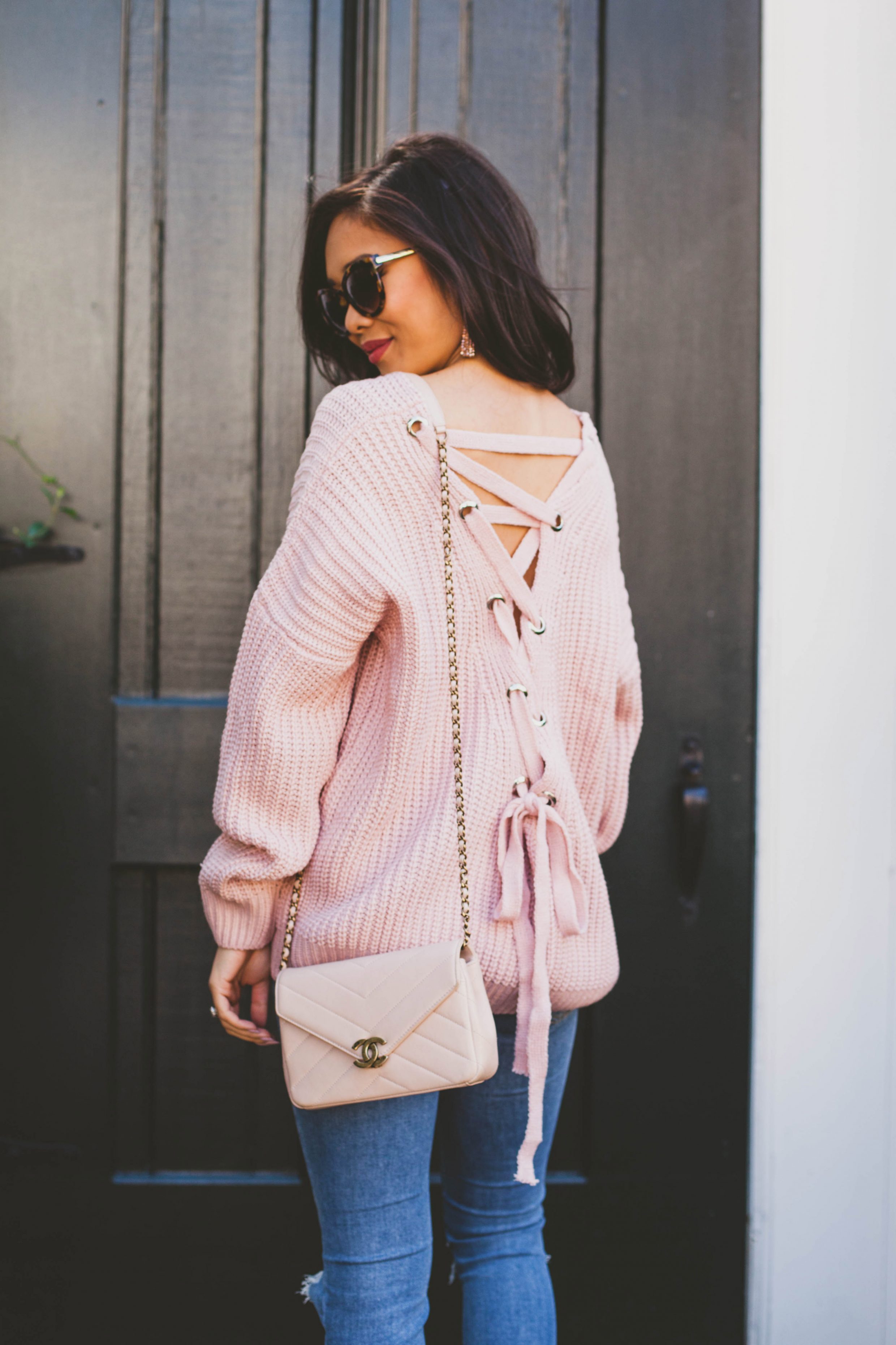 Blush lace up sweater and pink Chanel bag