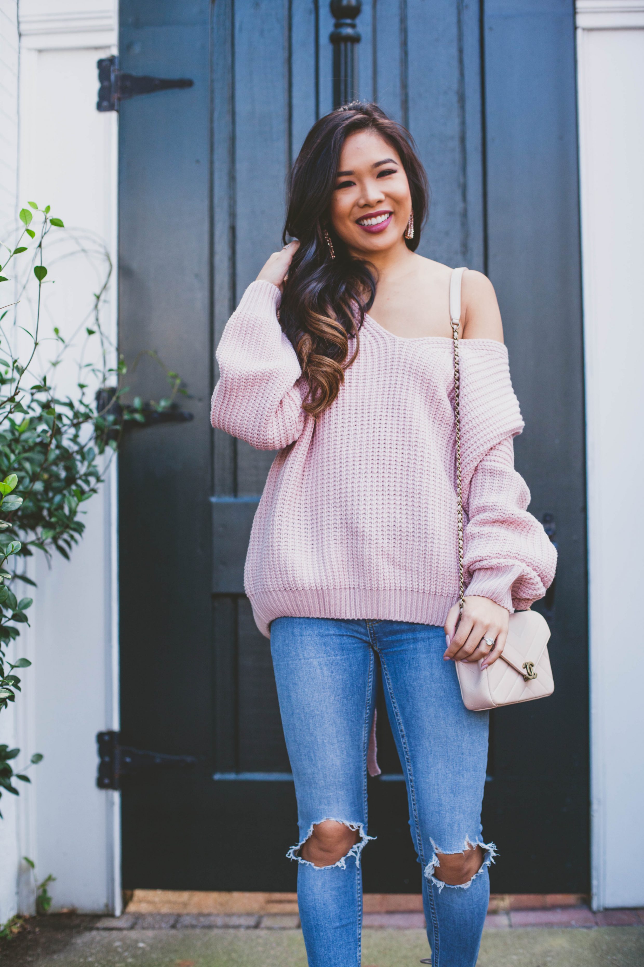 Blush lace up sweater and pink Chanel bag