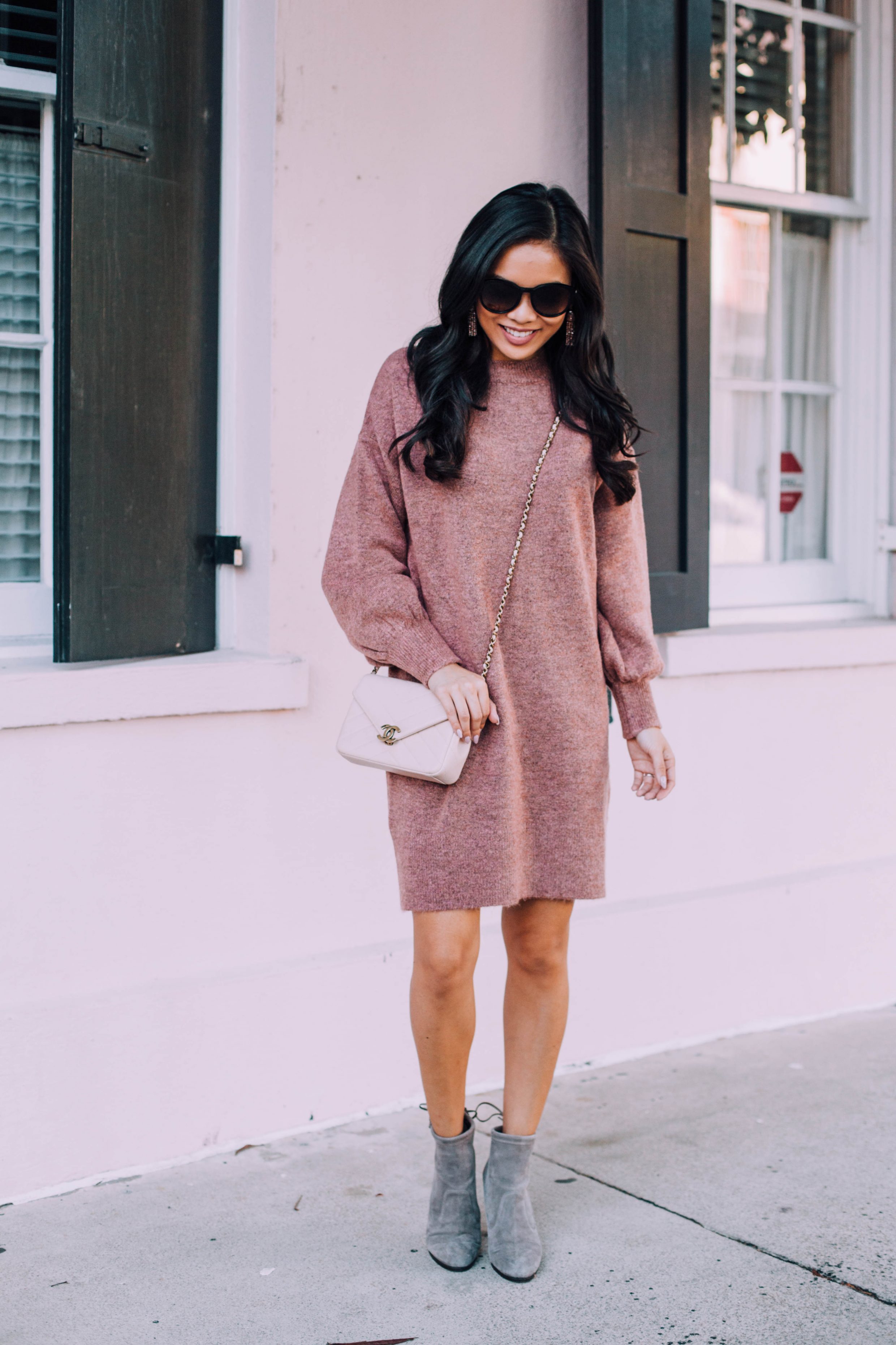 gray sweater dress with boots