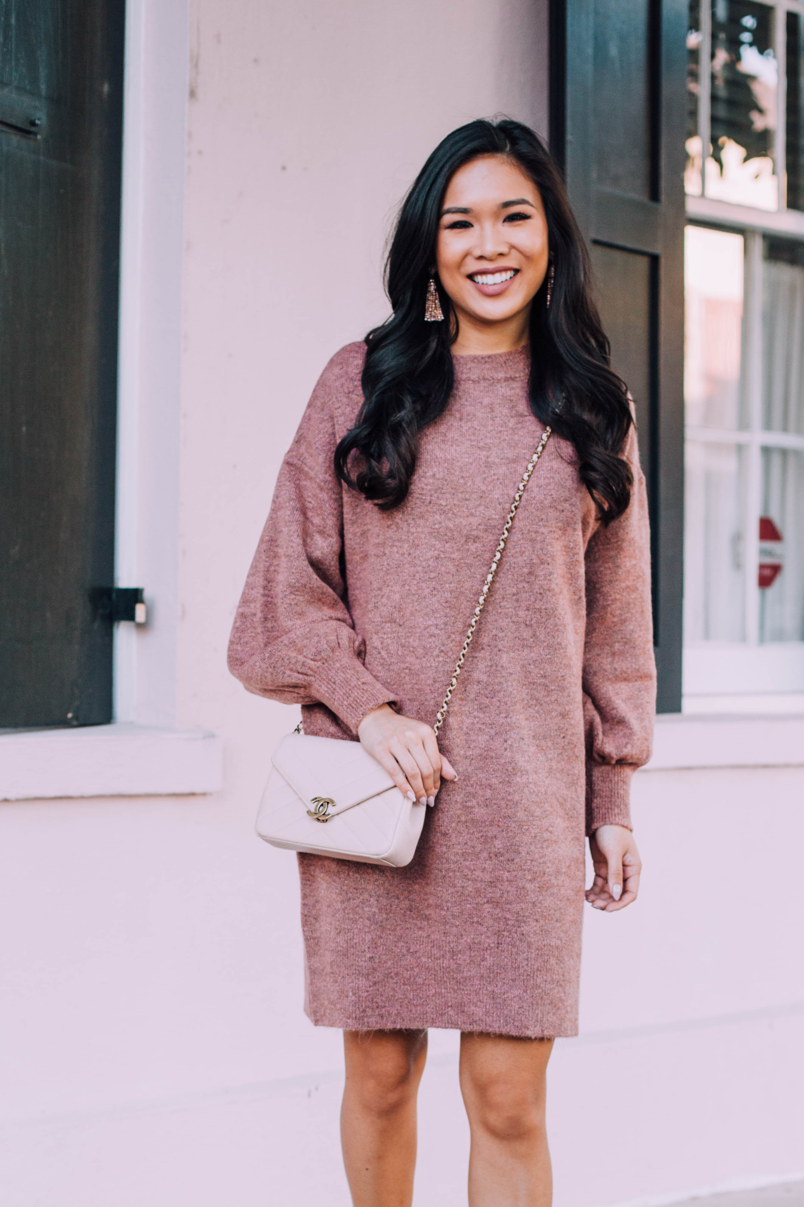 Mauve sweater dress with Chanel bag and Baublebar tassel earrings