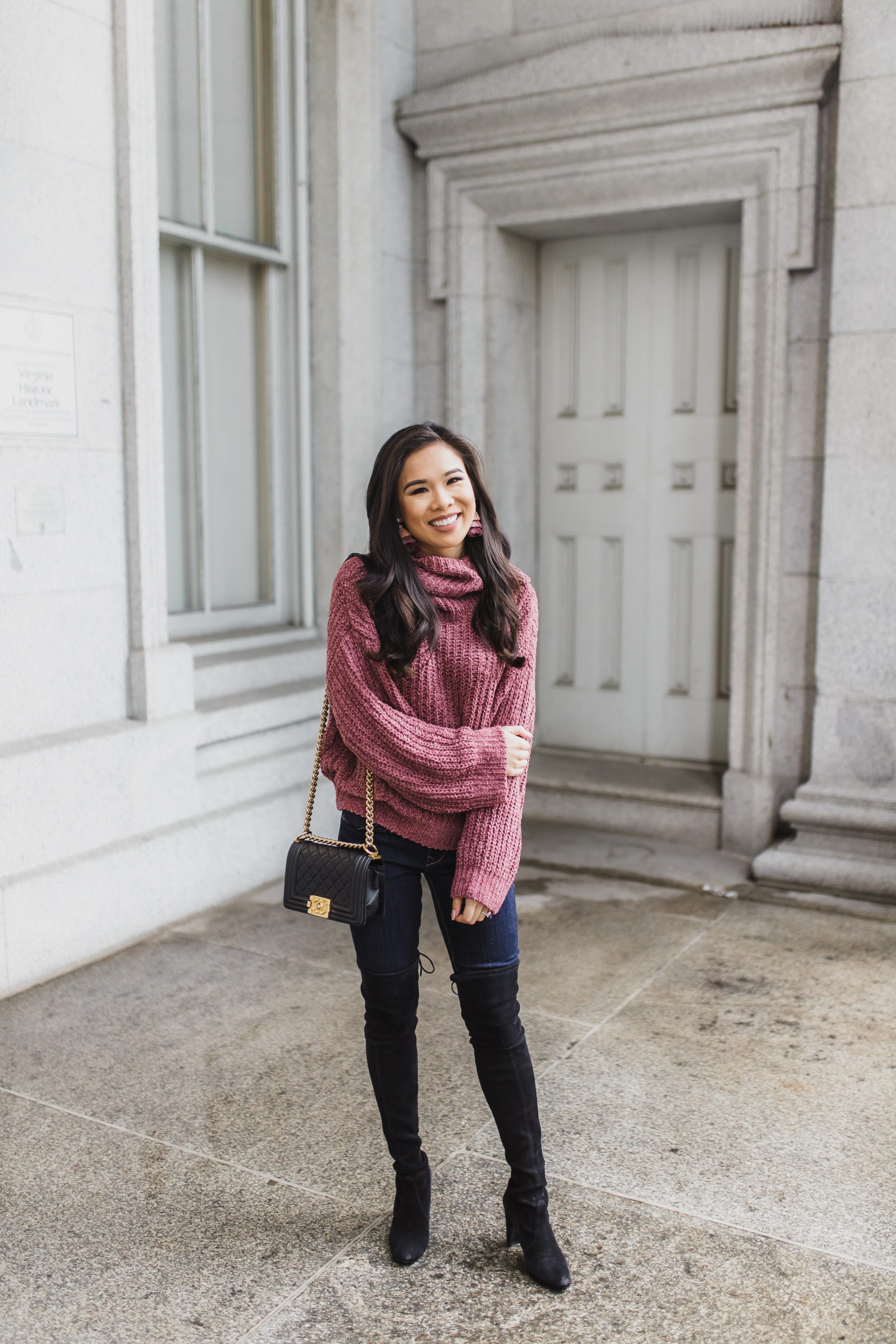 Mauve cowl neck sweater with over the knee boots and Chanel boy bag