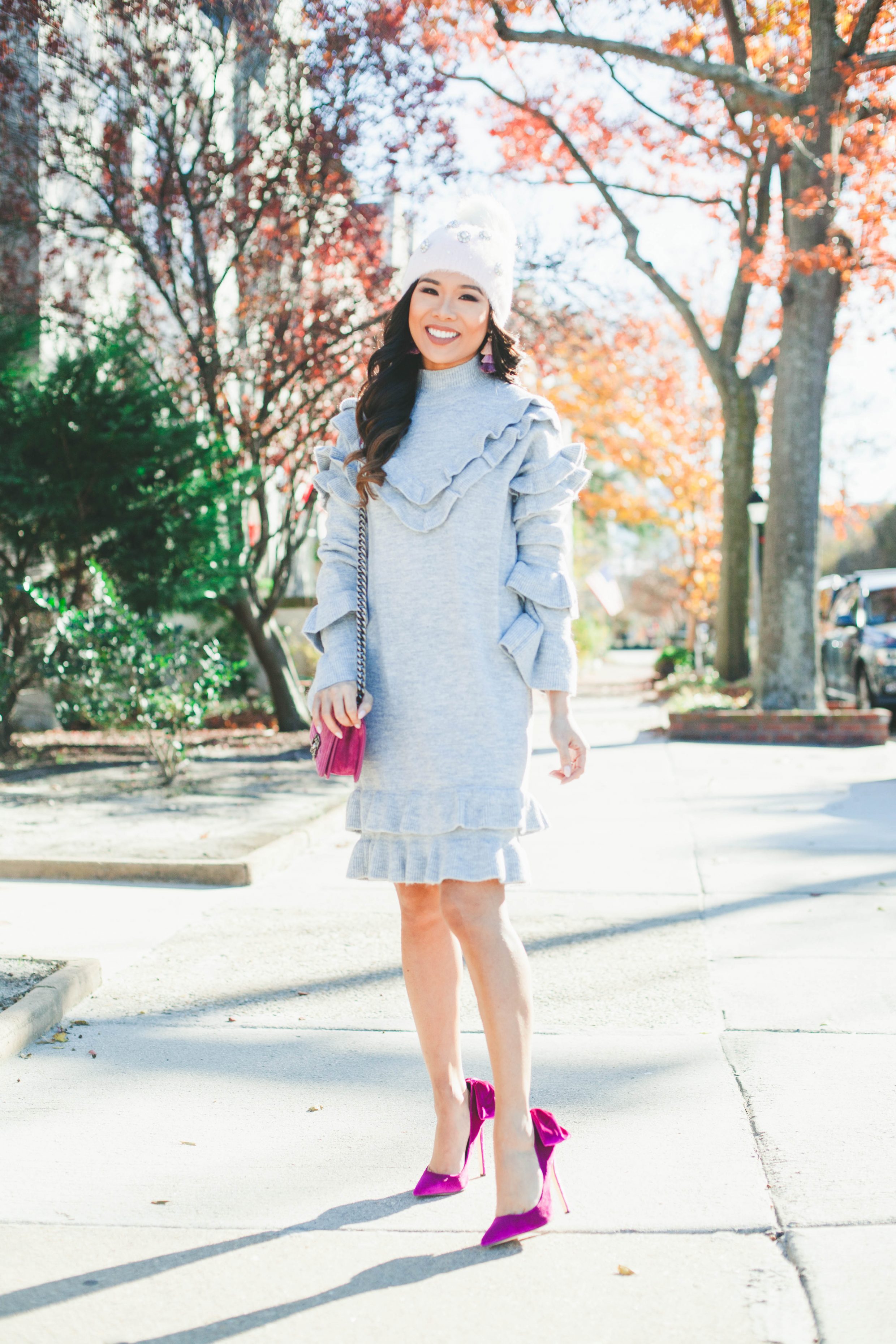 Gray ruffle sweater dress with velvet bow back heels and Chanel bag
