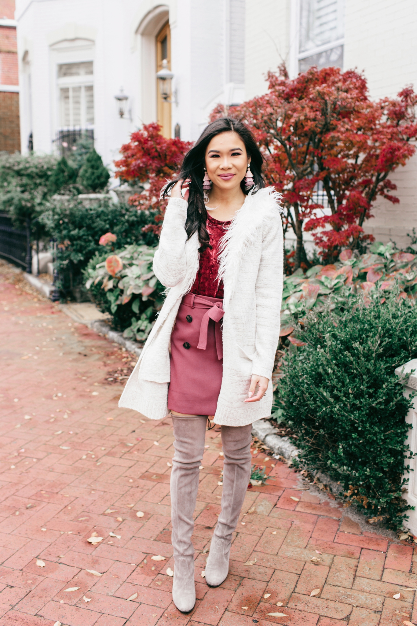 Roadie Sweater with faux fur collar and Saigon Tassel Earrings over a trench skirt