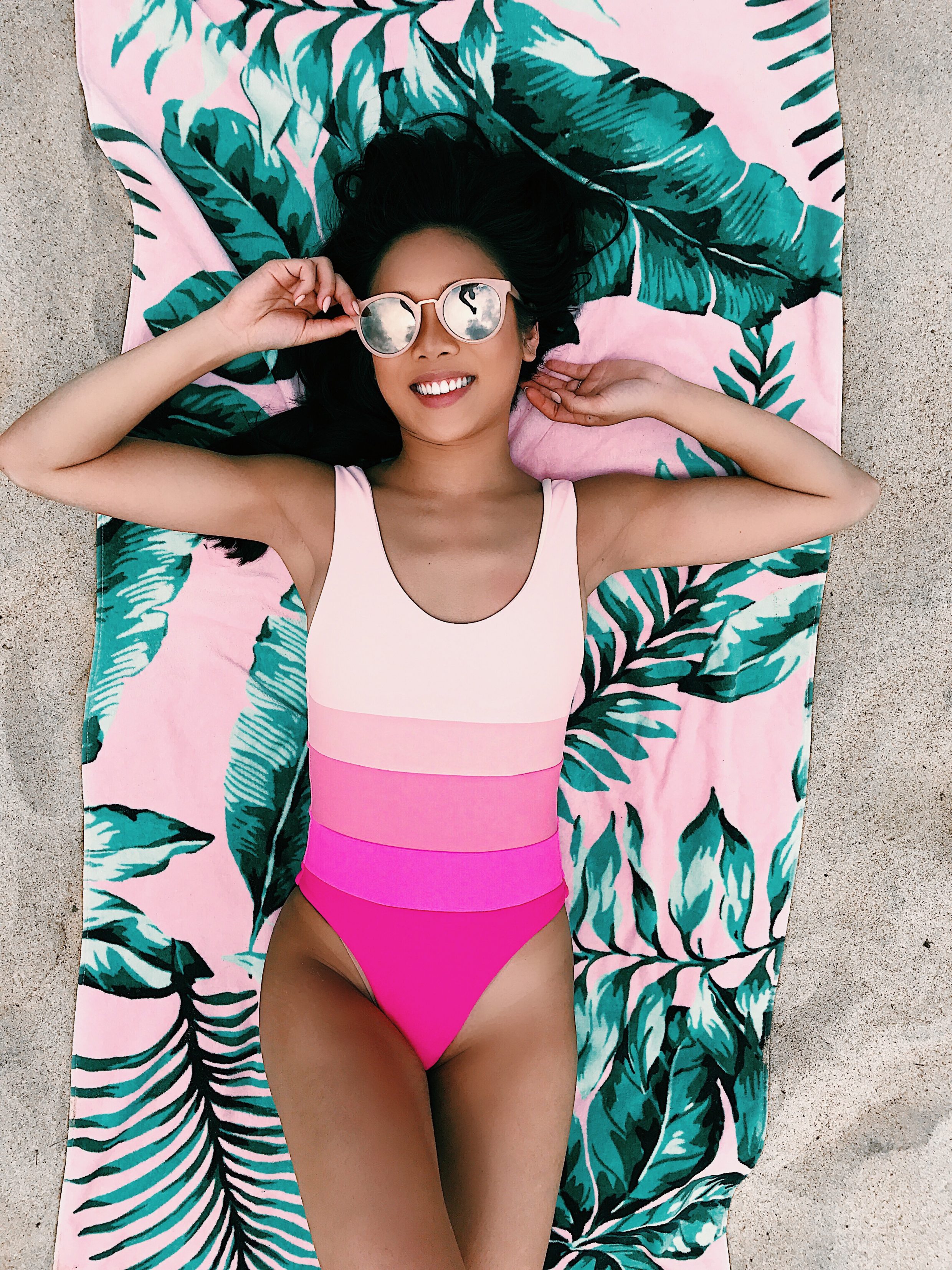 Pink ombre one piece swimsuit and palm print towel
