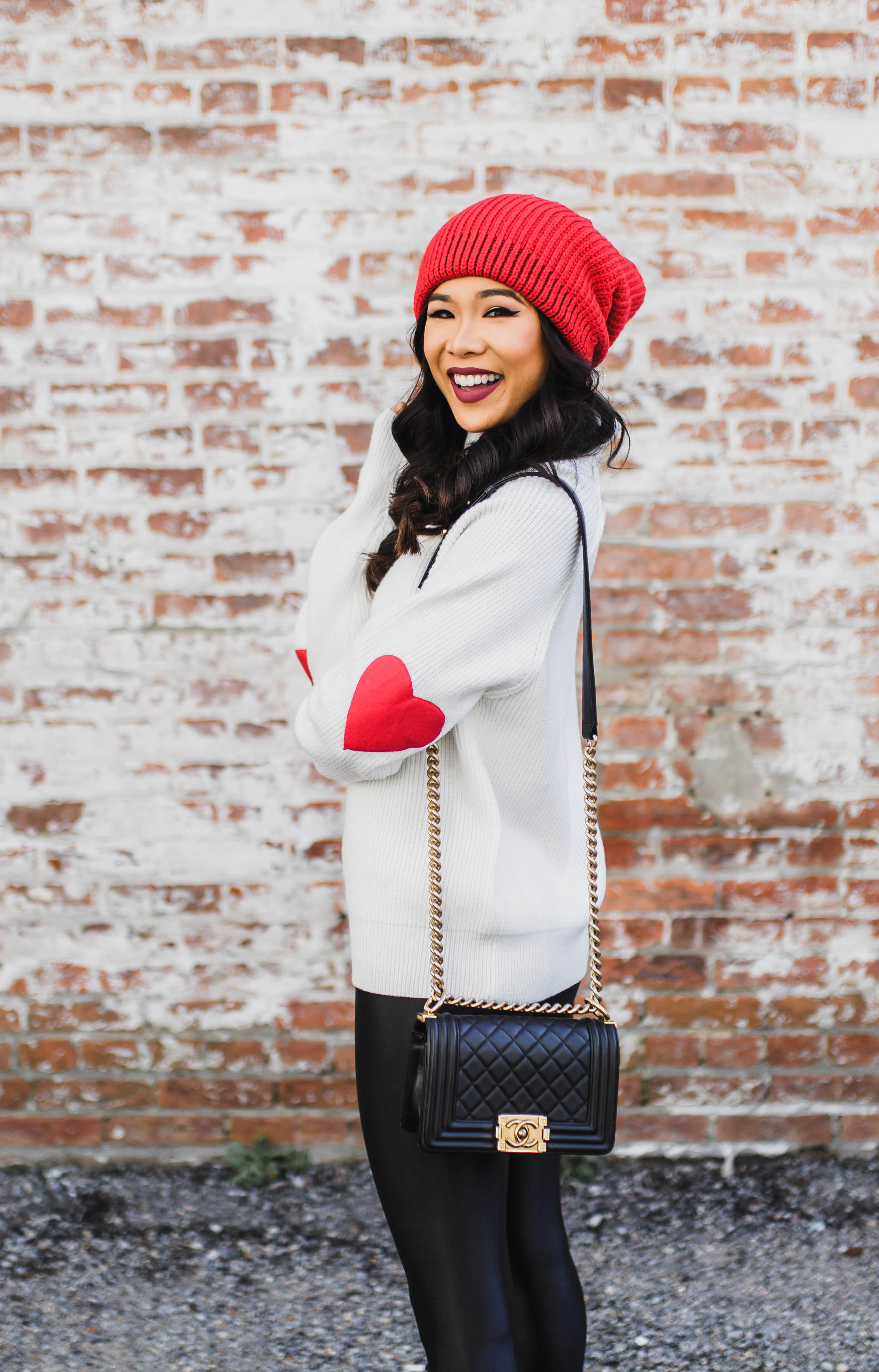 Heart Patch Sweater with black leggings and red slouchy beanie