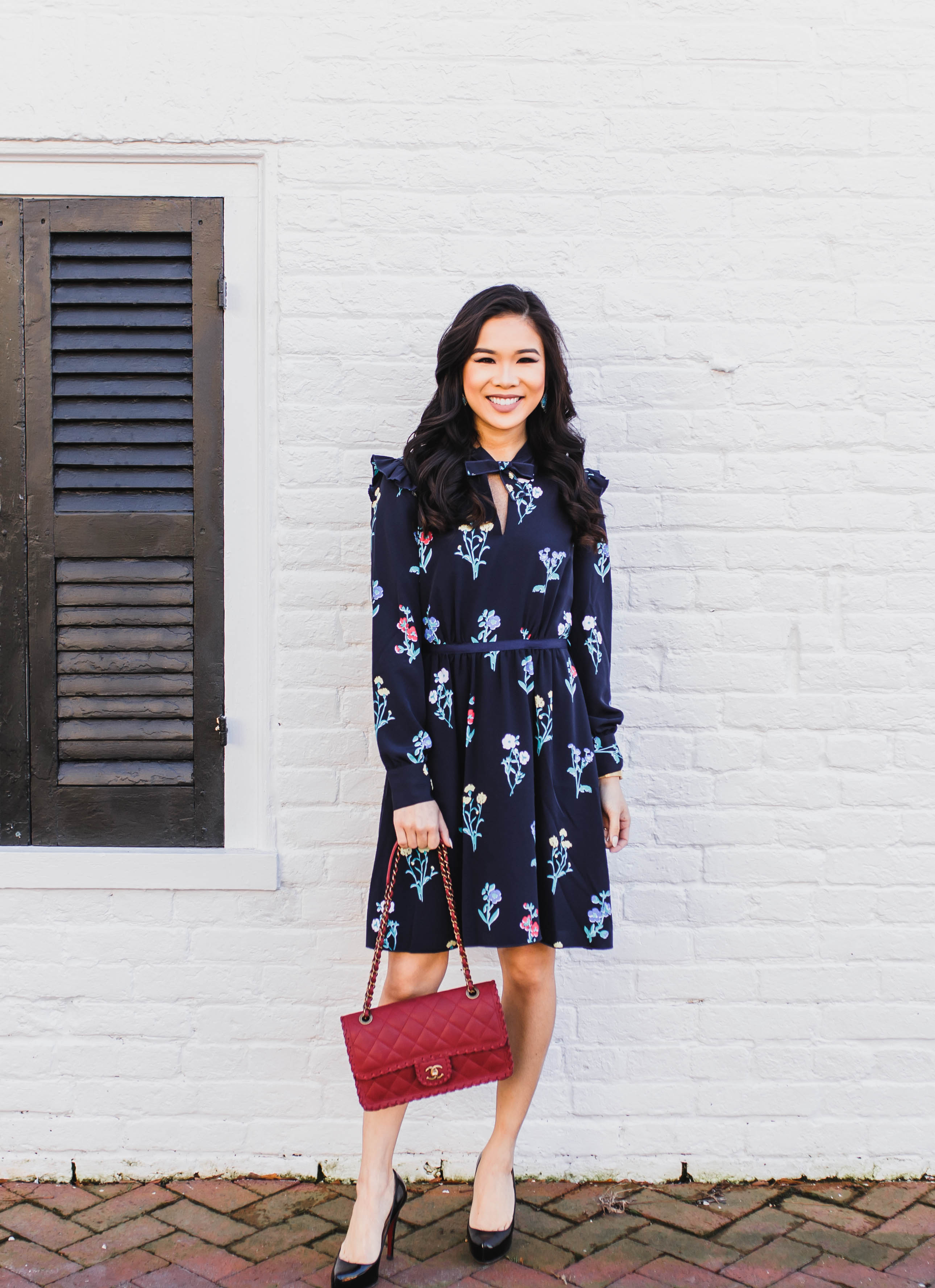 Blogger Hoang-Kim wears the Tisdale floral dress for Spring with a red Chanel flap bag