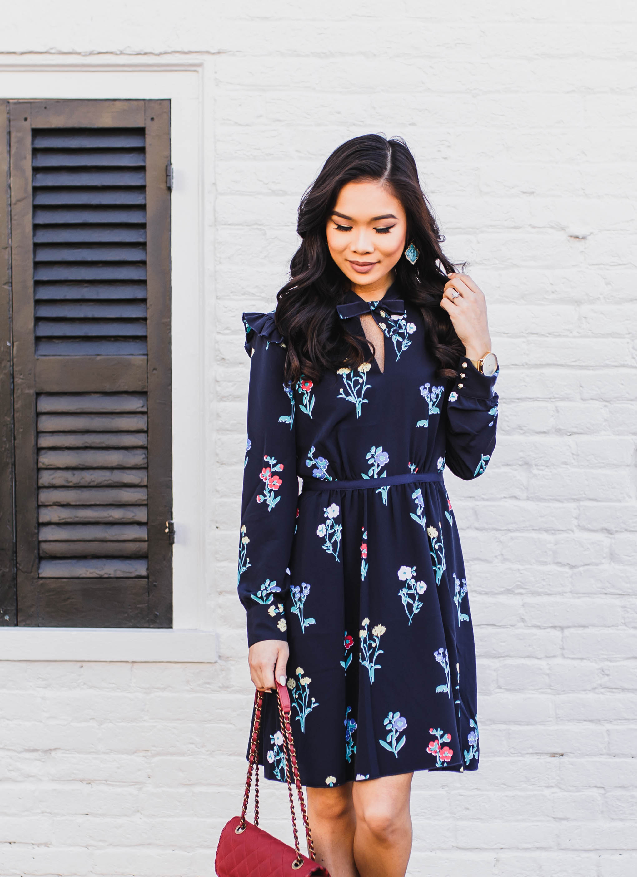 Blogger Hoang-Kim wears the Tisdale floral dress for Spring with a red Chanel flap bag