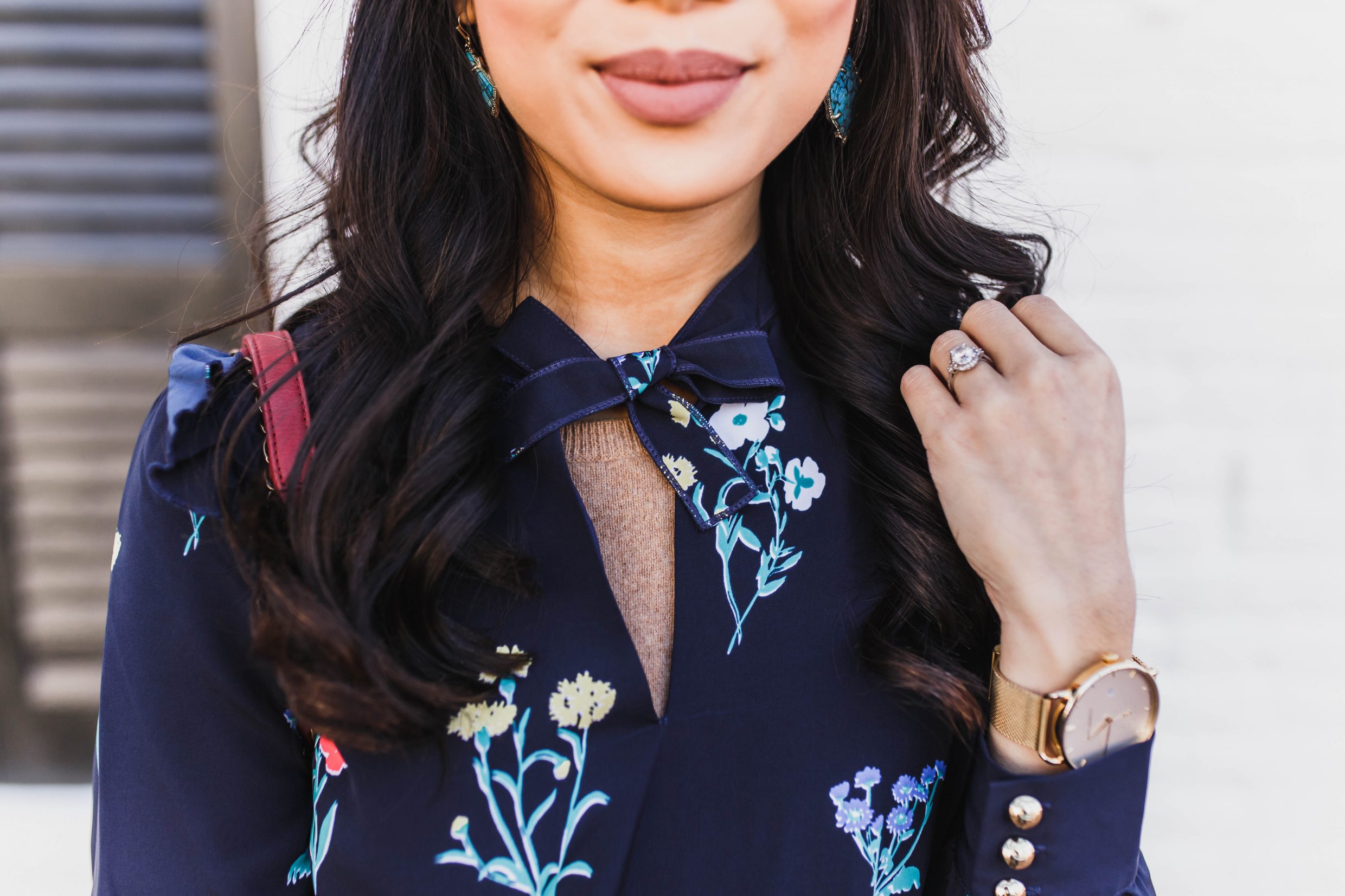 Blogger Hoang-Kim wears the Tisdale floral dress for Spring with a gold Paul Hewitt watch