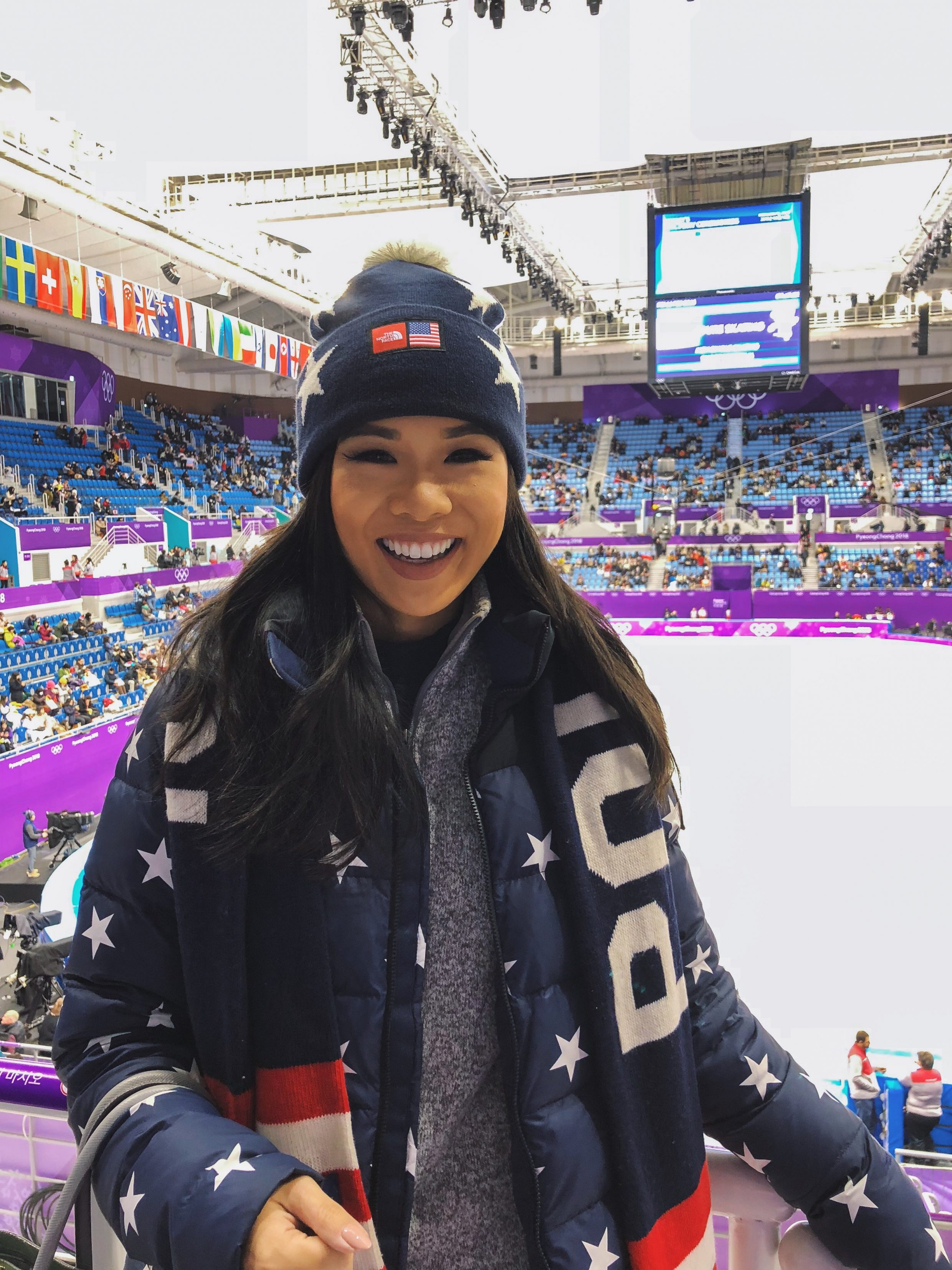 Hoang-Kim wearing The North Face Star Print Team USA Gear inside Gangneung Ice Arena at the PyeongChang 2018 Winter Olympics before the Mens Figure Skating Short Program event