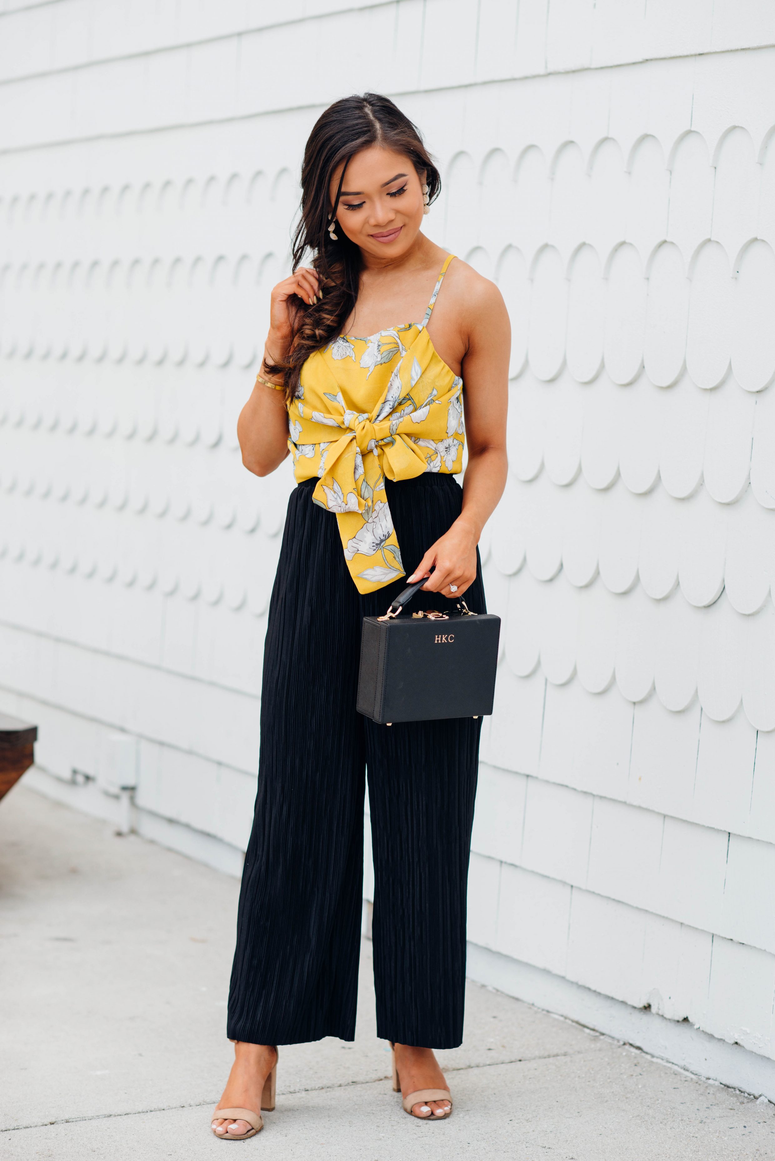 Hoang-Kim styles a crop top you can wear two ways with black wide-leg pants and box bag