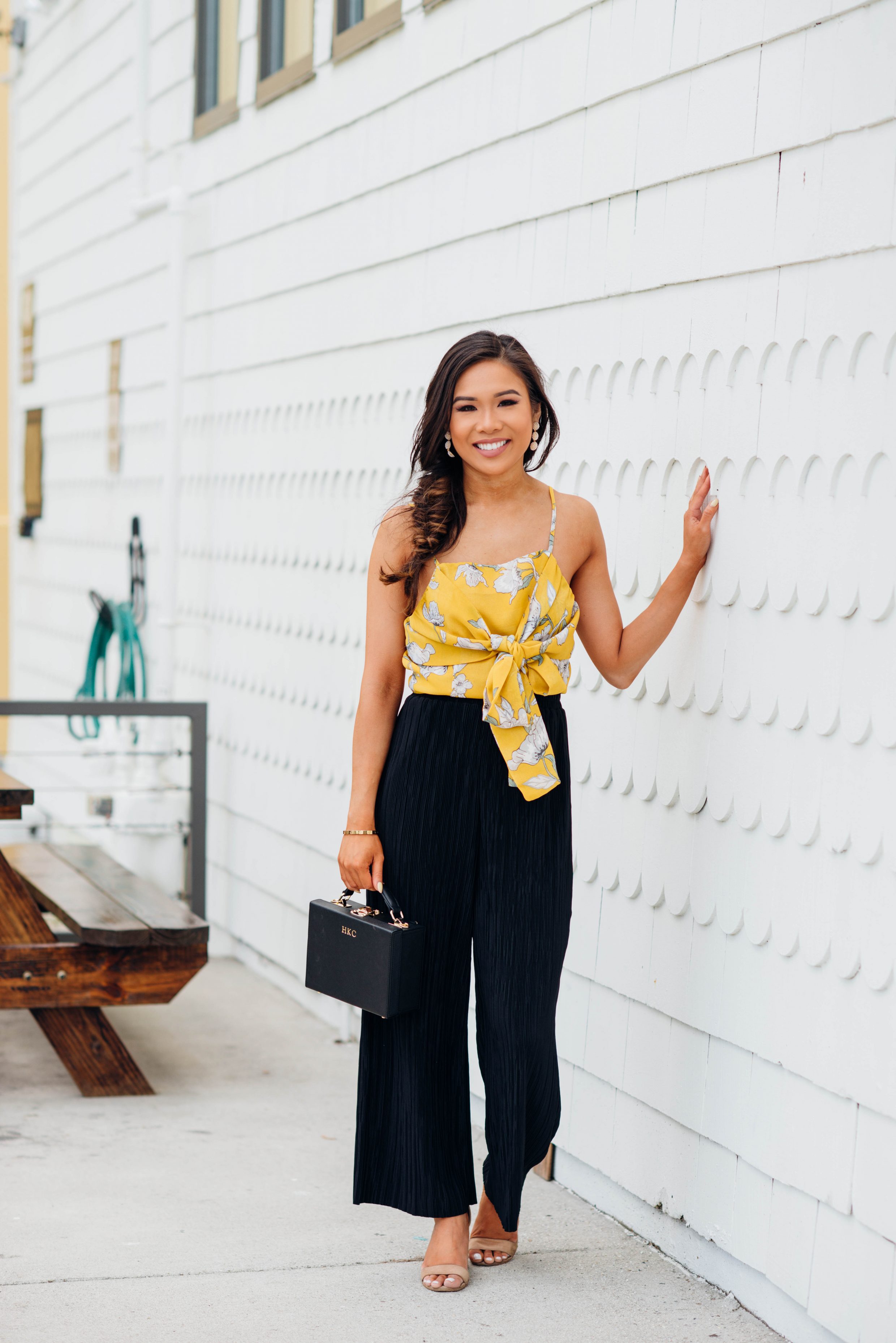 Hoang-Kim wears a JOA Tie-front crop top with Topshop wide leg pants and The Daily Edited Box Bag