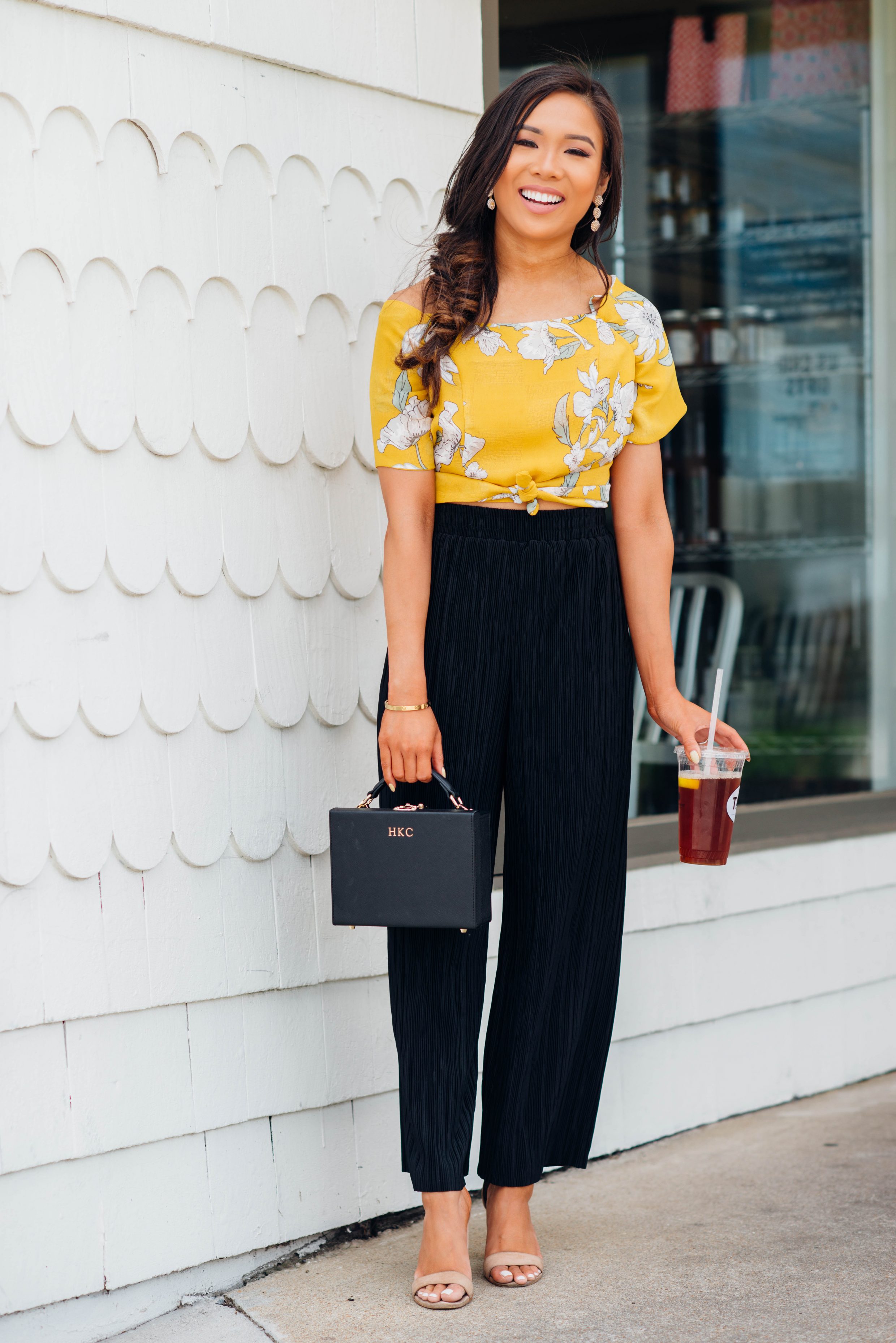 Hoang-Kim wears a JOA Tie-front crop top with Topshop wide leg pants and The Daily Edited Box Bag