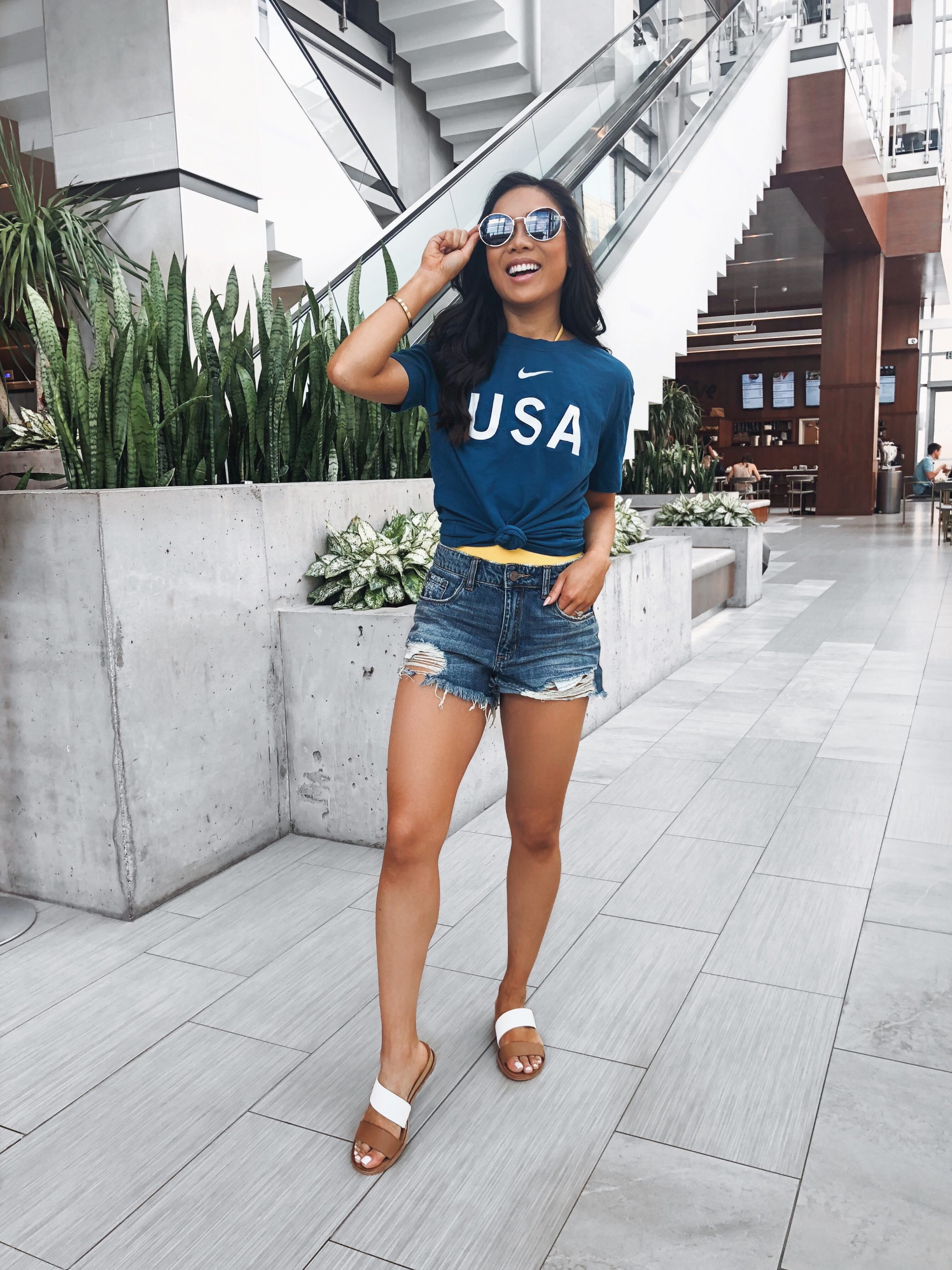 Nike Team USA t-shirt, distressed shorts and dolce vita sandals
