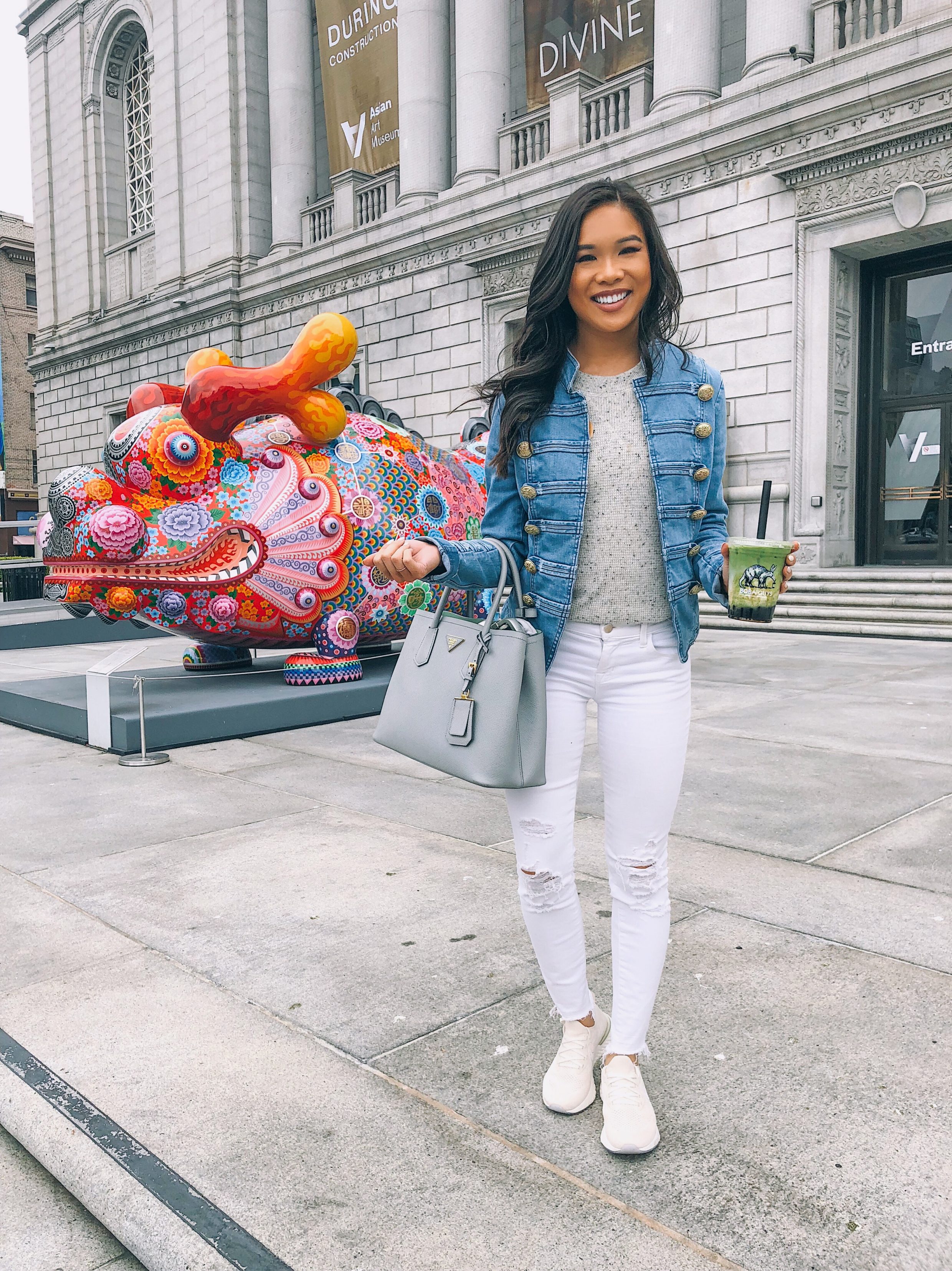 My first time at Boba Guys wearing white distressed jeans, Nike epic react sneakers and denim military jacket - San Francisco Travel Guide
