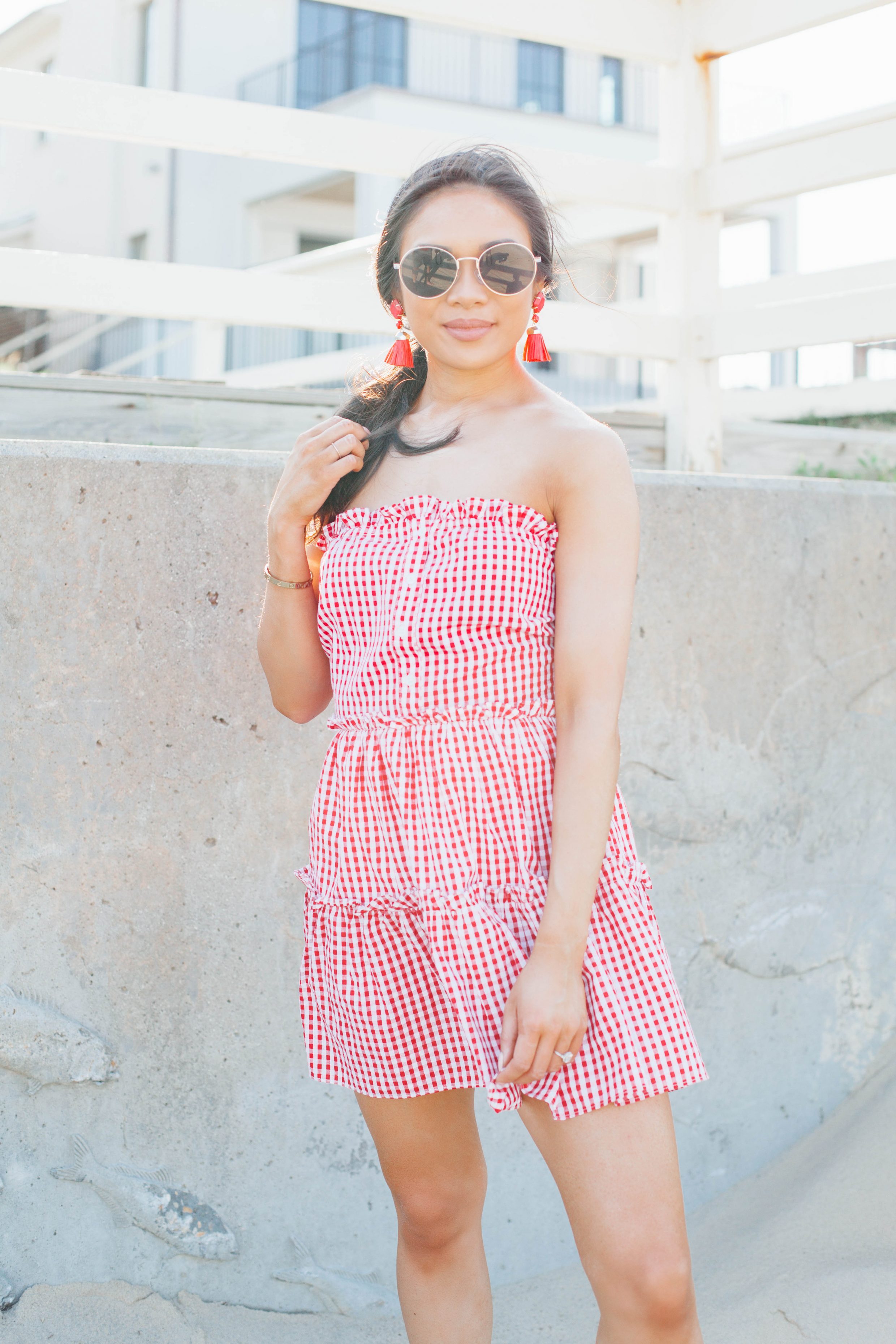 Summer outfit - red strapless gingham dress with raffia tassel earrings