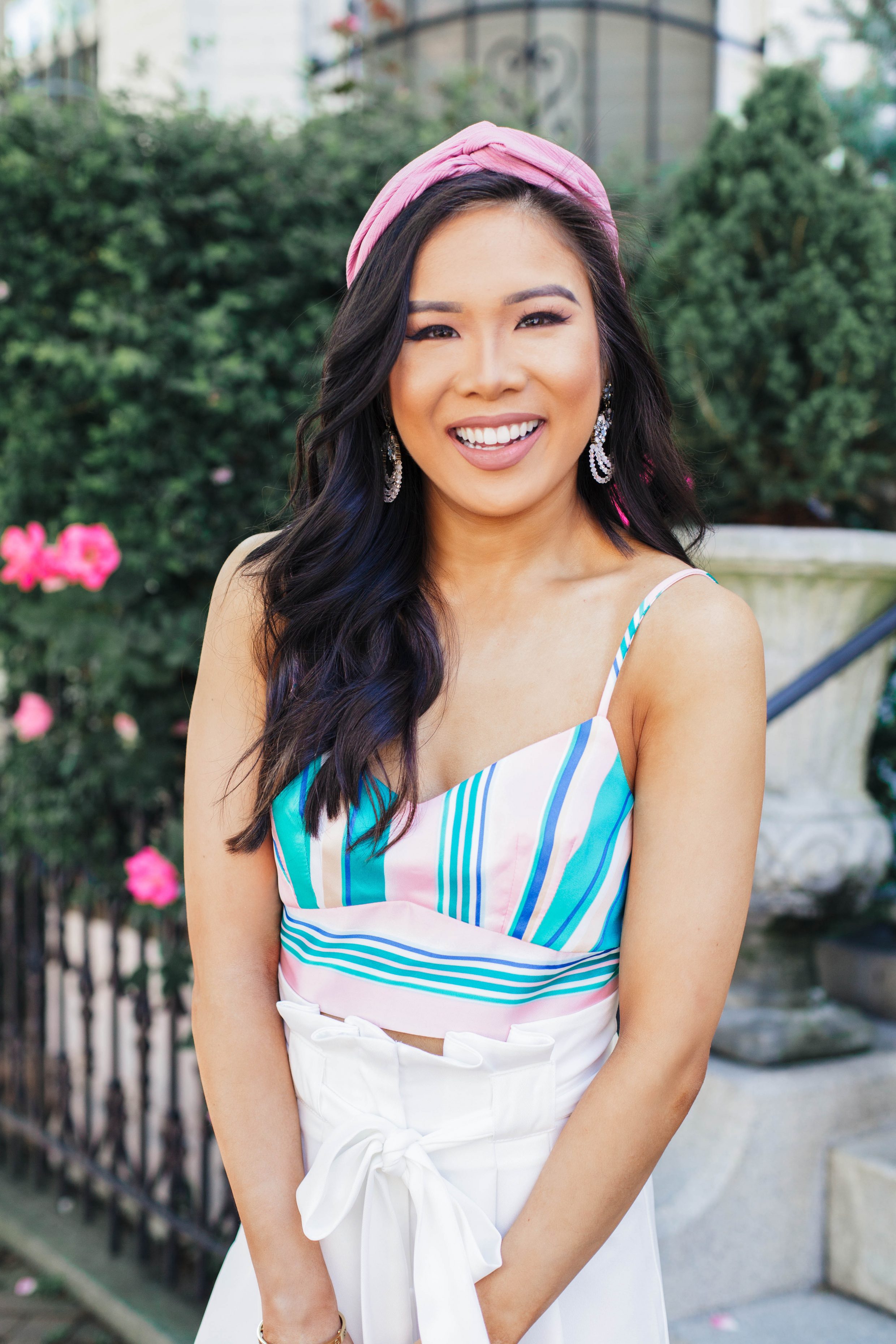 Striped crop top with a pink headband for summer outfit idea