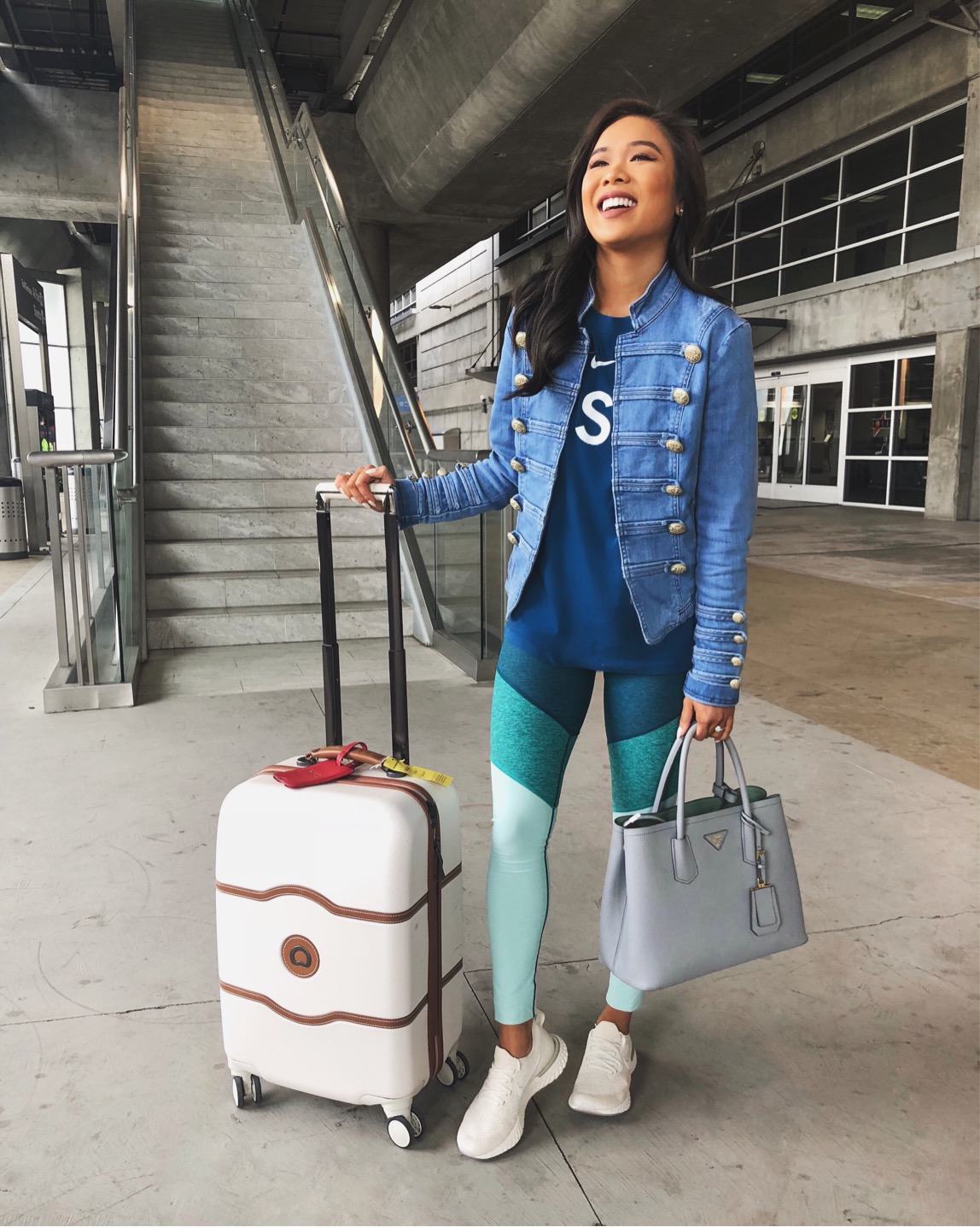 Travel style with colorblock leggings, Nike epic react sneakers and denim military jacket