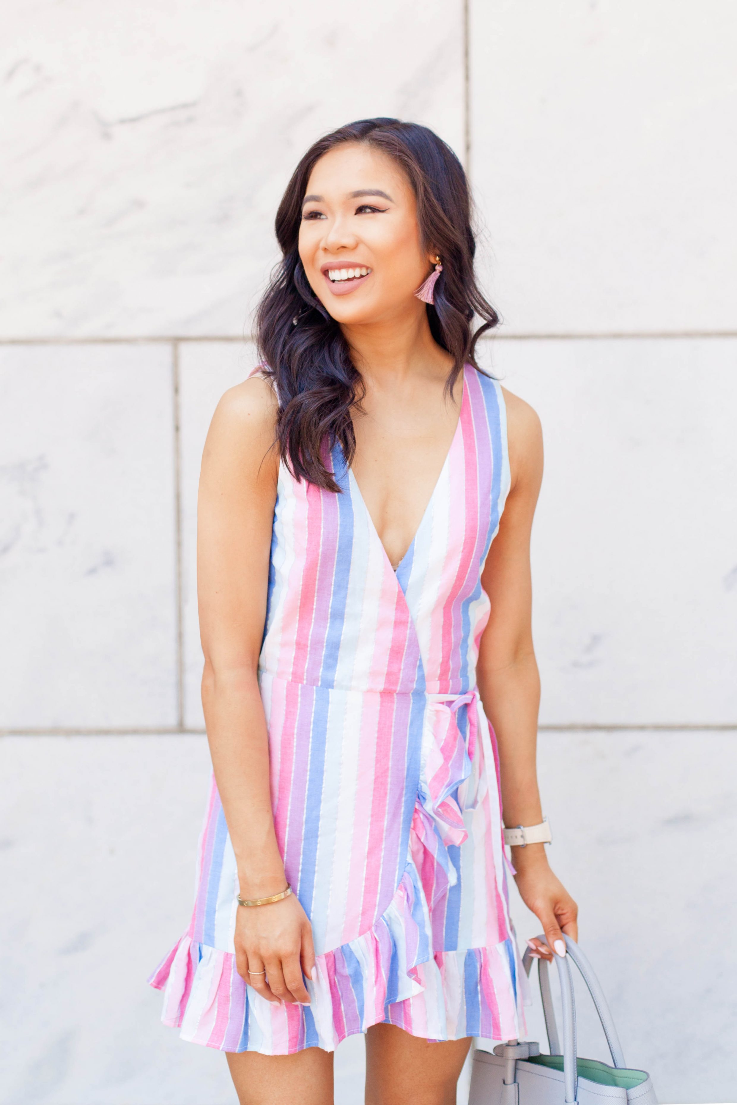 Pastel striped dress for summer with ruffle hem