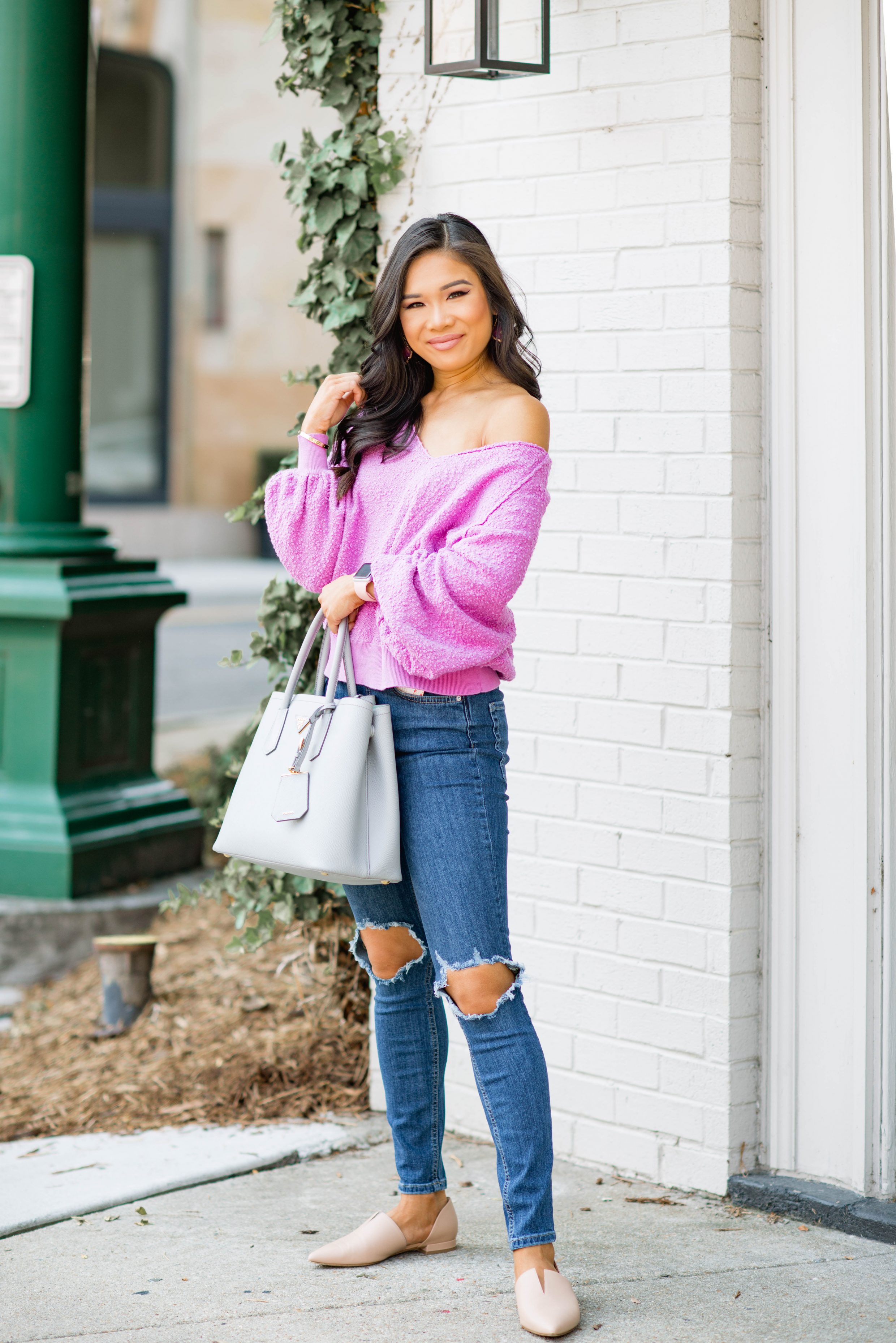 Hoang-Kim wears an easy fall outfit idea with slouchy free people balloon sleeve sweater, jeans and d'orsay nude flats