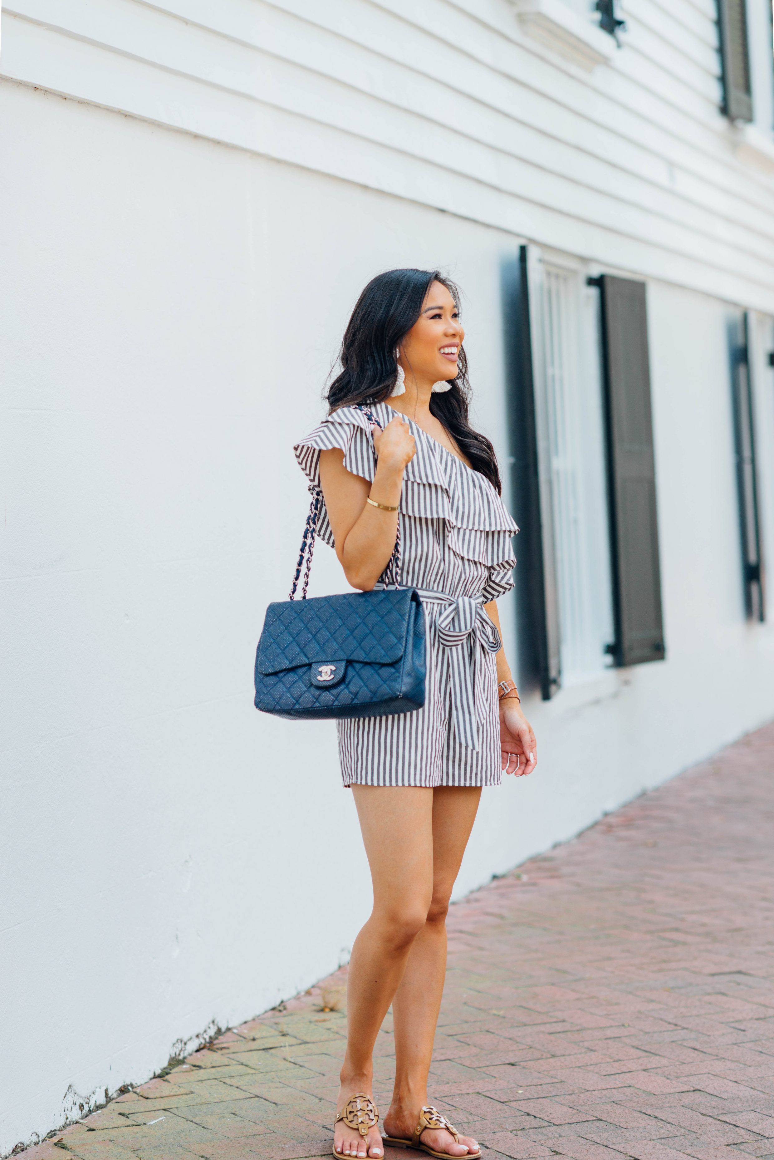 Striped Romper and navy Chanel flap bag