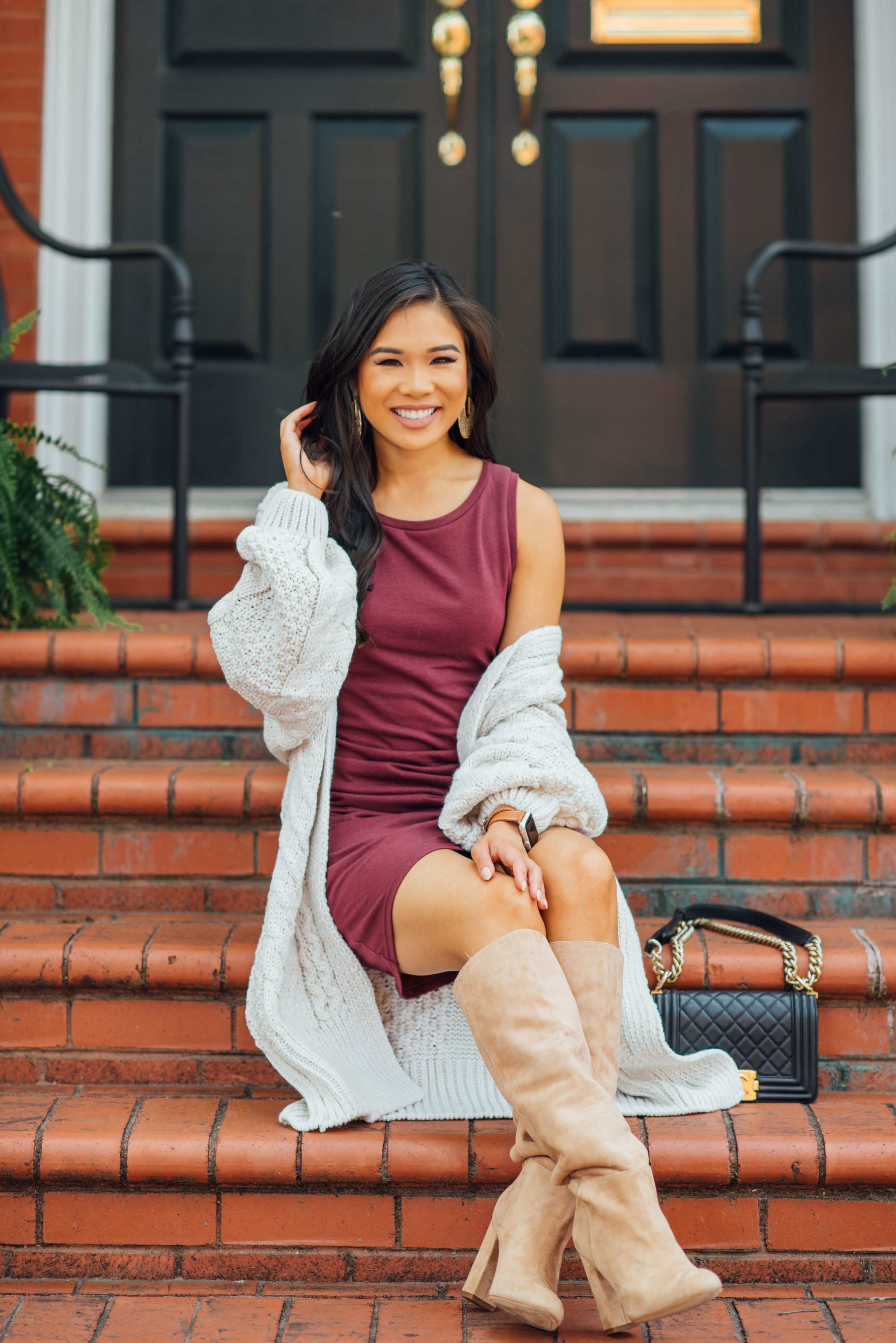 Fall style with a tank dress, oversized cardigan and boots