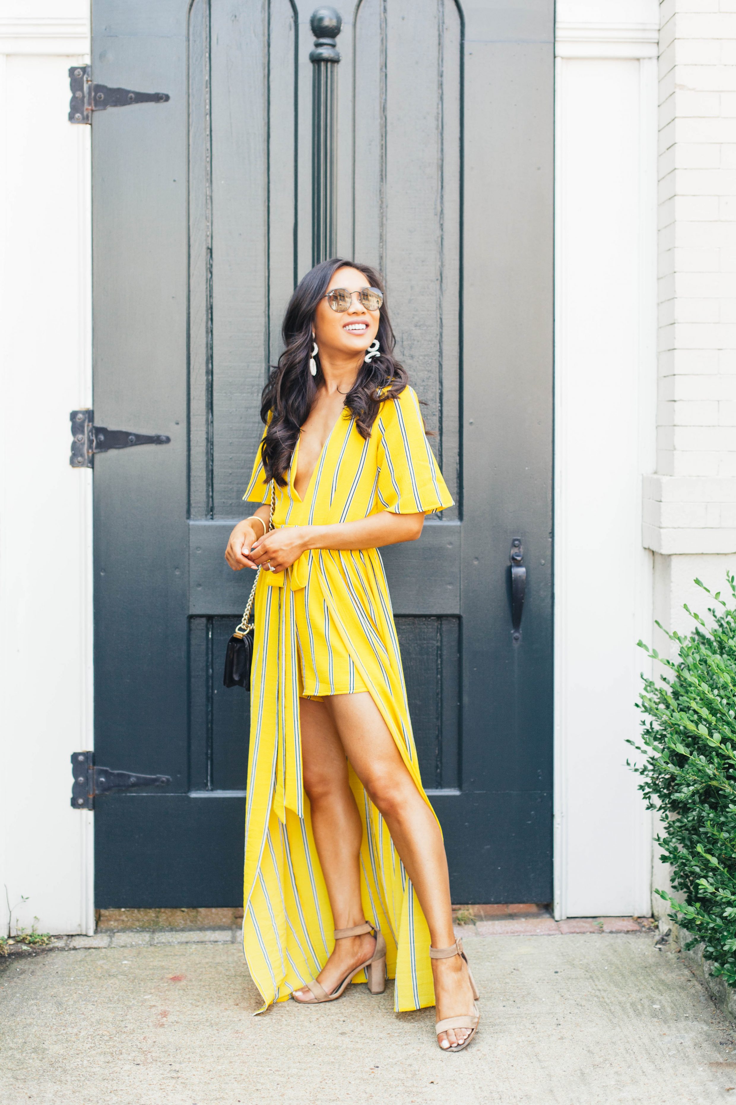 Yellow wrap jumpsuit and heels for summer