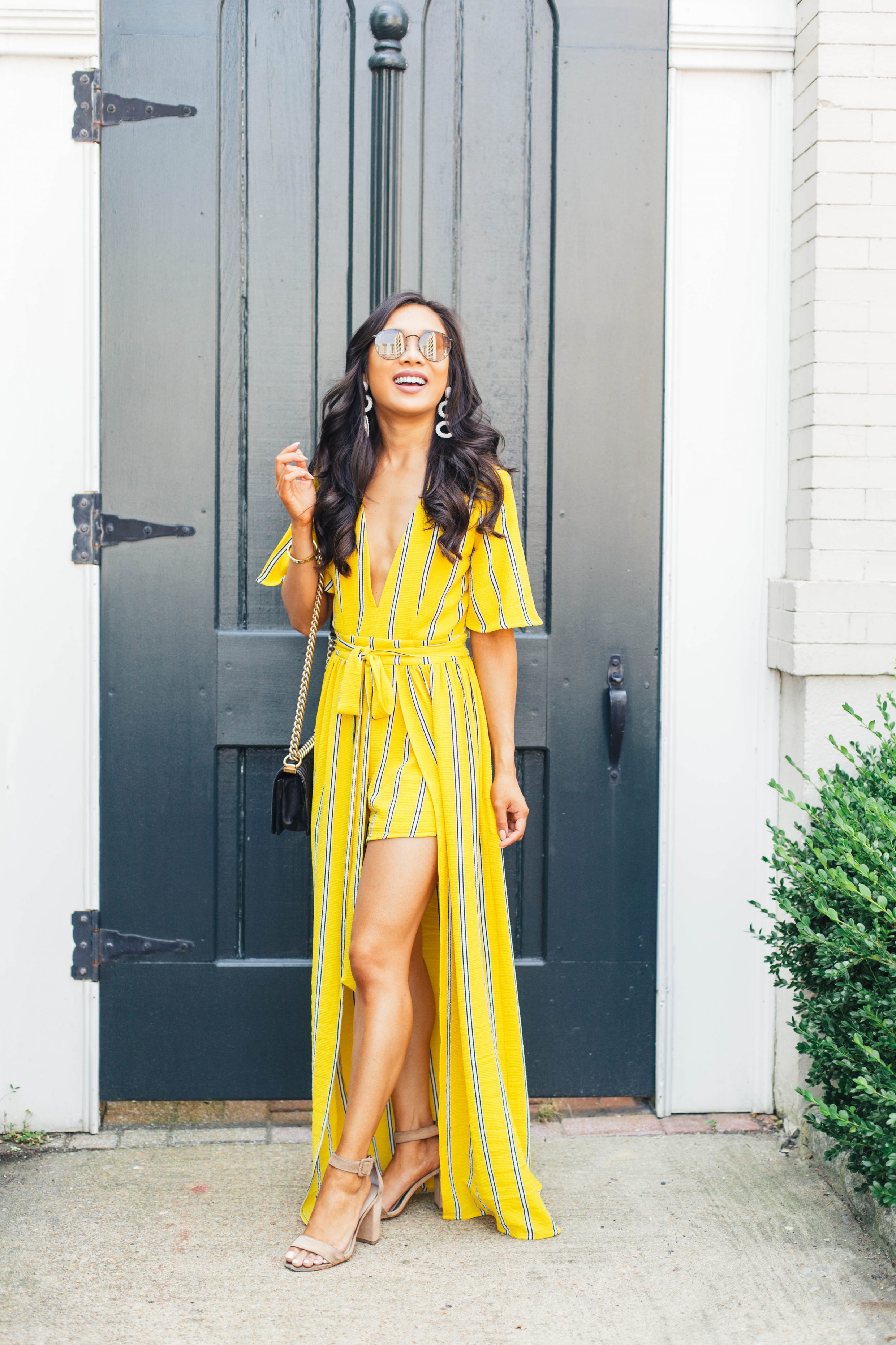 Yellow wrap striped jumpsuit and heels for summer
