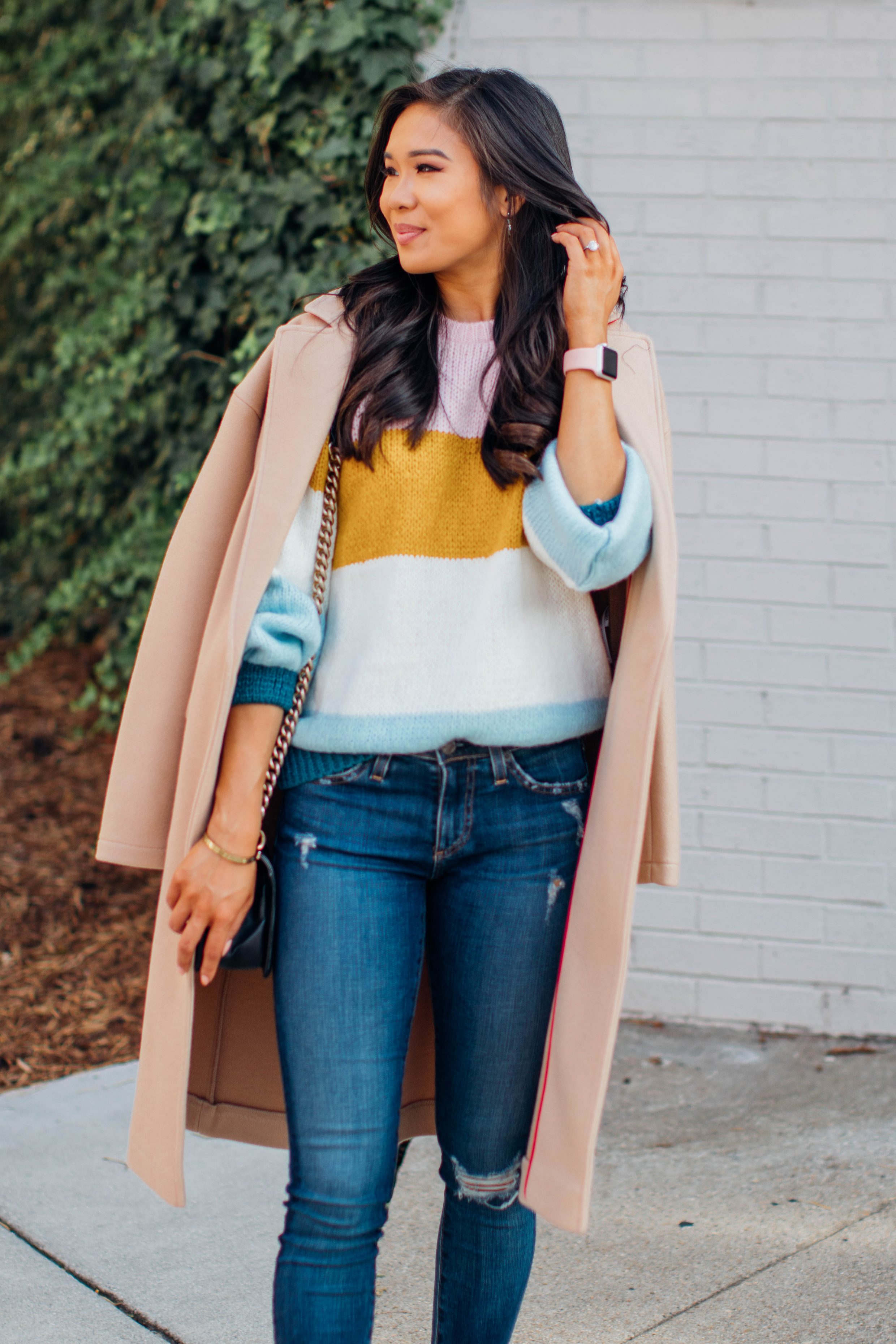 Colorblock sweater and distressed jeans for fall fashion