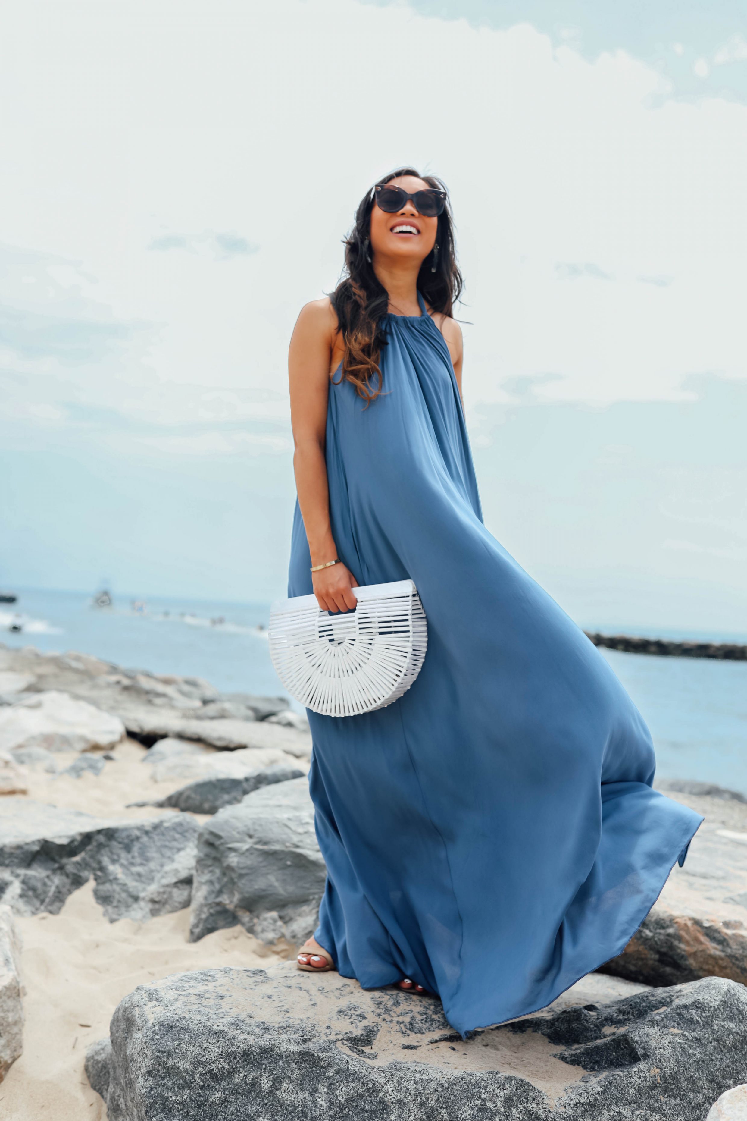 Hoang-Kim of Color & Chic wears an indigo maxi dress with pockets