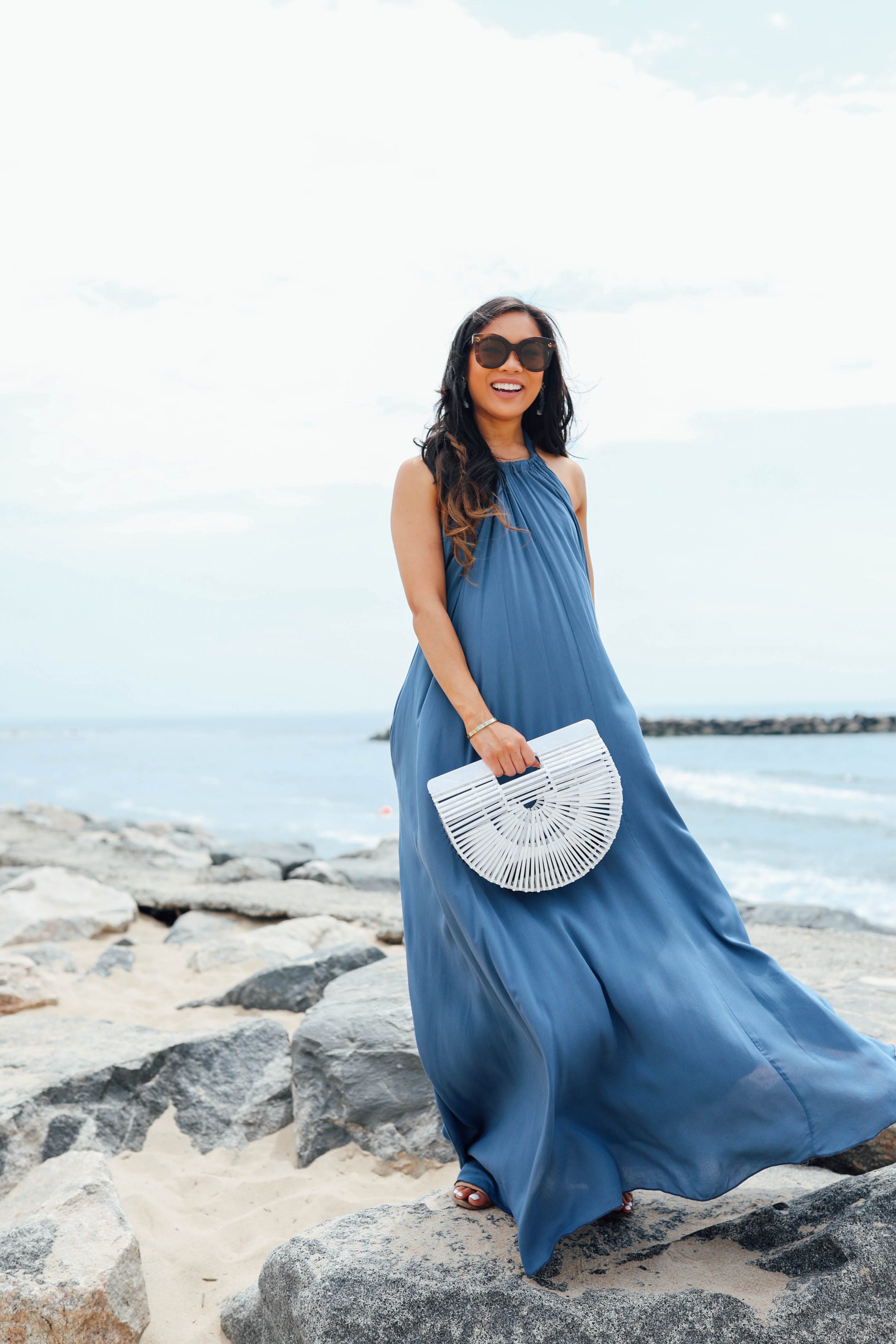 Hoang-Kim of Color & Chic wears a seadrift halter pocketed dress from Vici Dolls with Celine sunglasses