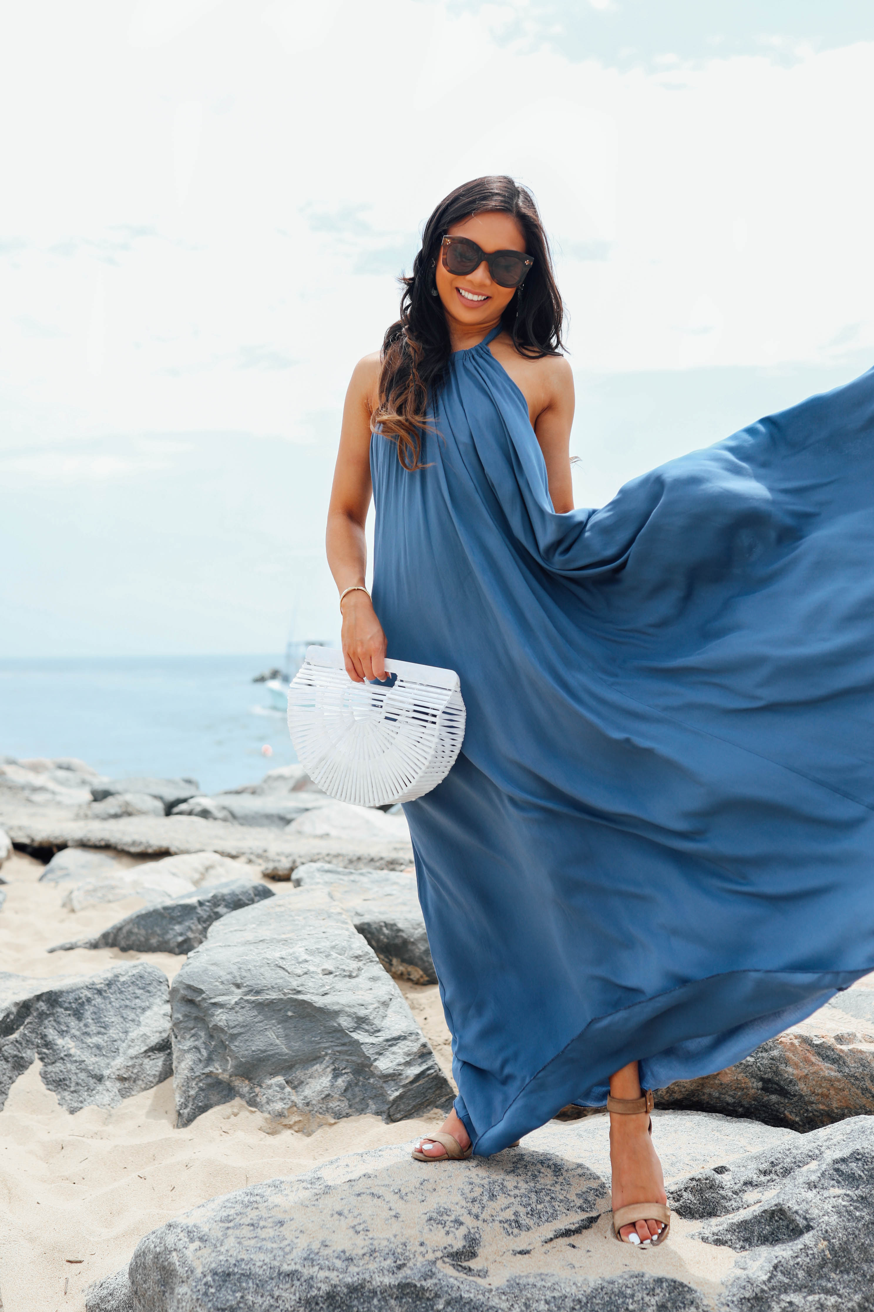 Hoang-Kim of Color & Chic wears an indigo maxi dress with pockets