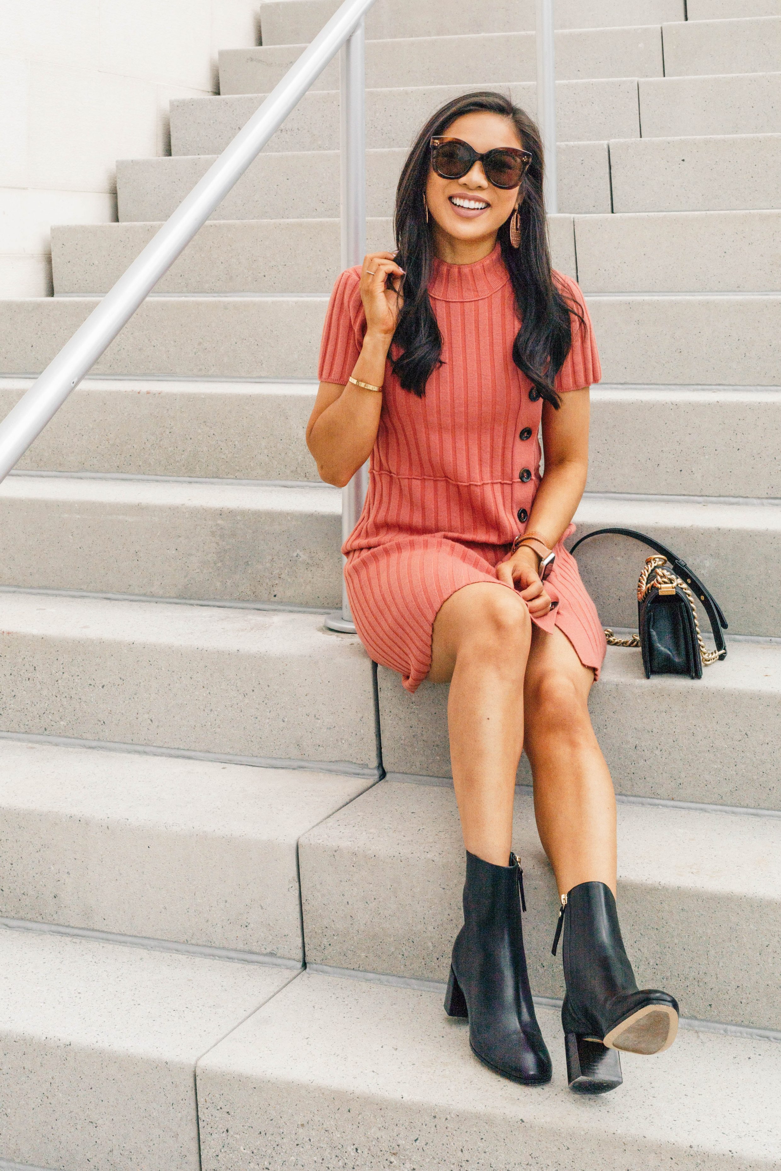 Blogger Hoang-Kim wears a free people dress with M. Gemi booties for fall