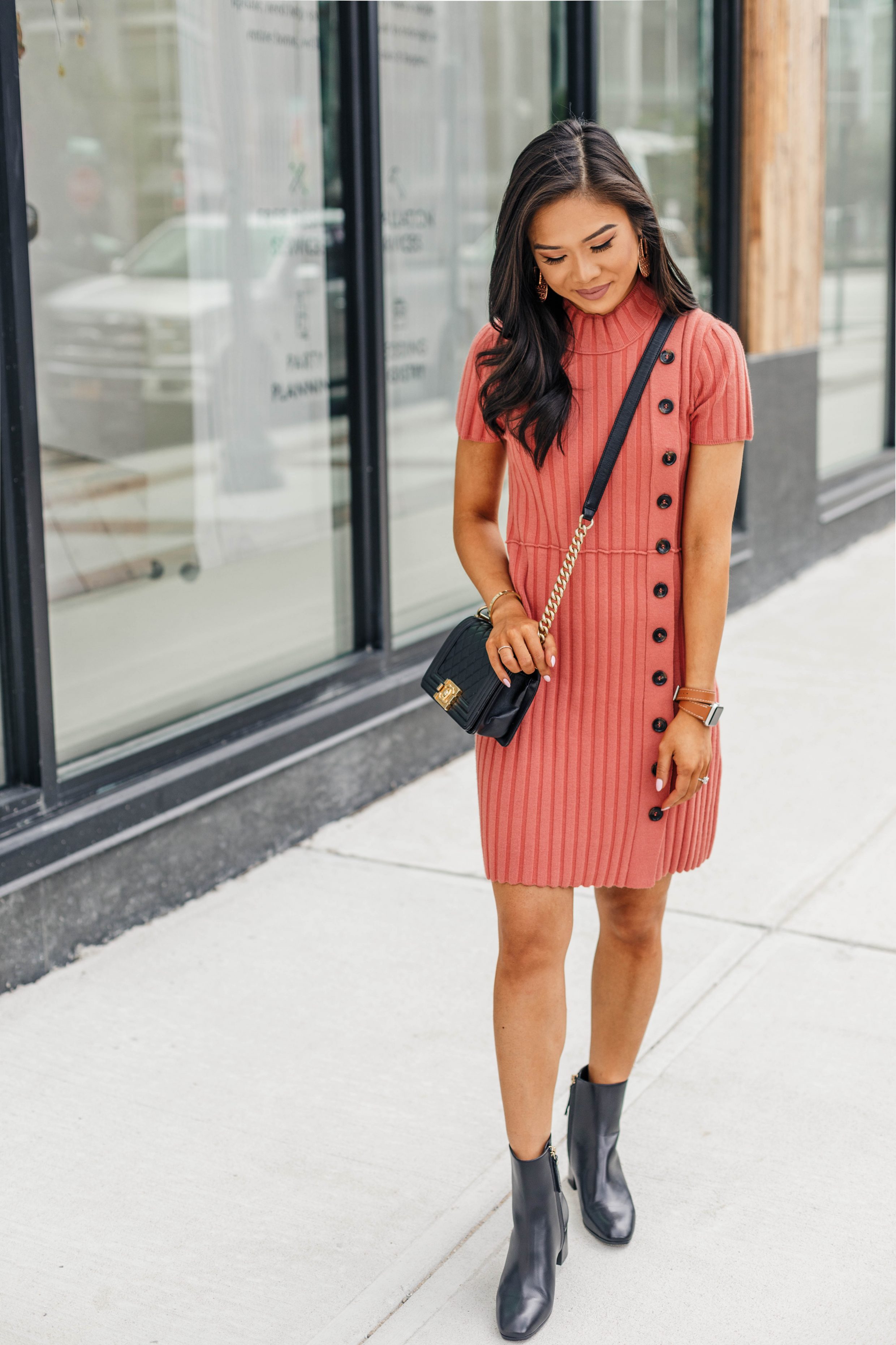 Blogger Hoang-Kim styles the Corsa bootie for fall with a coral ribbed dress
