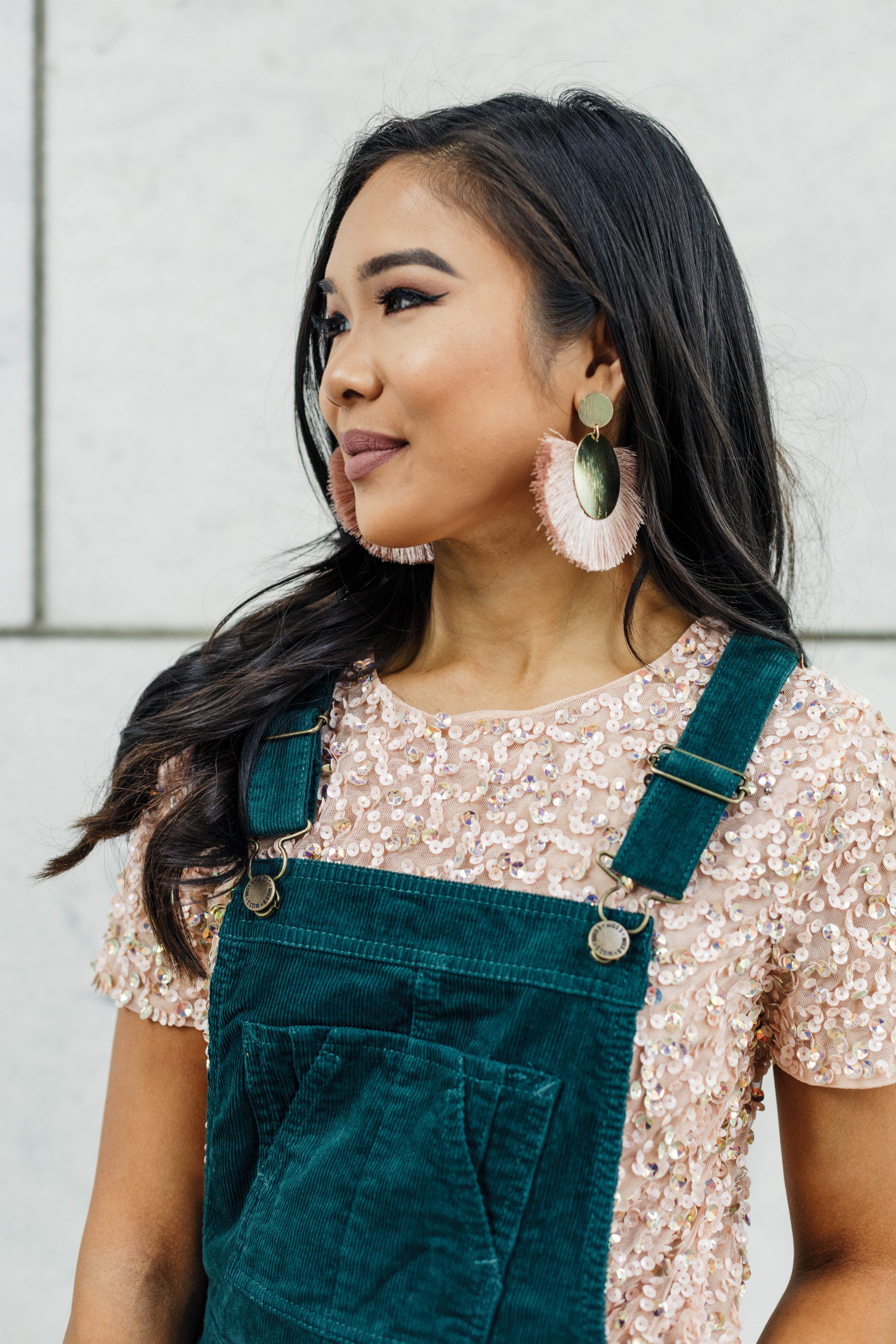 Hoang-Kim wears olive + piper earrings to complete her overall dress look