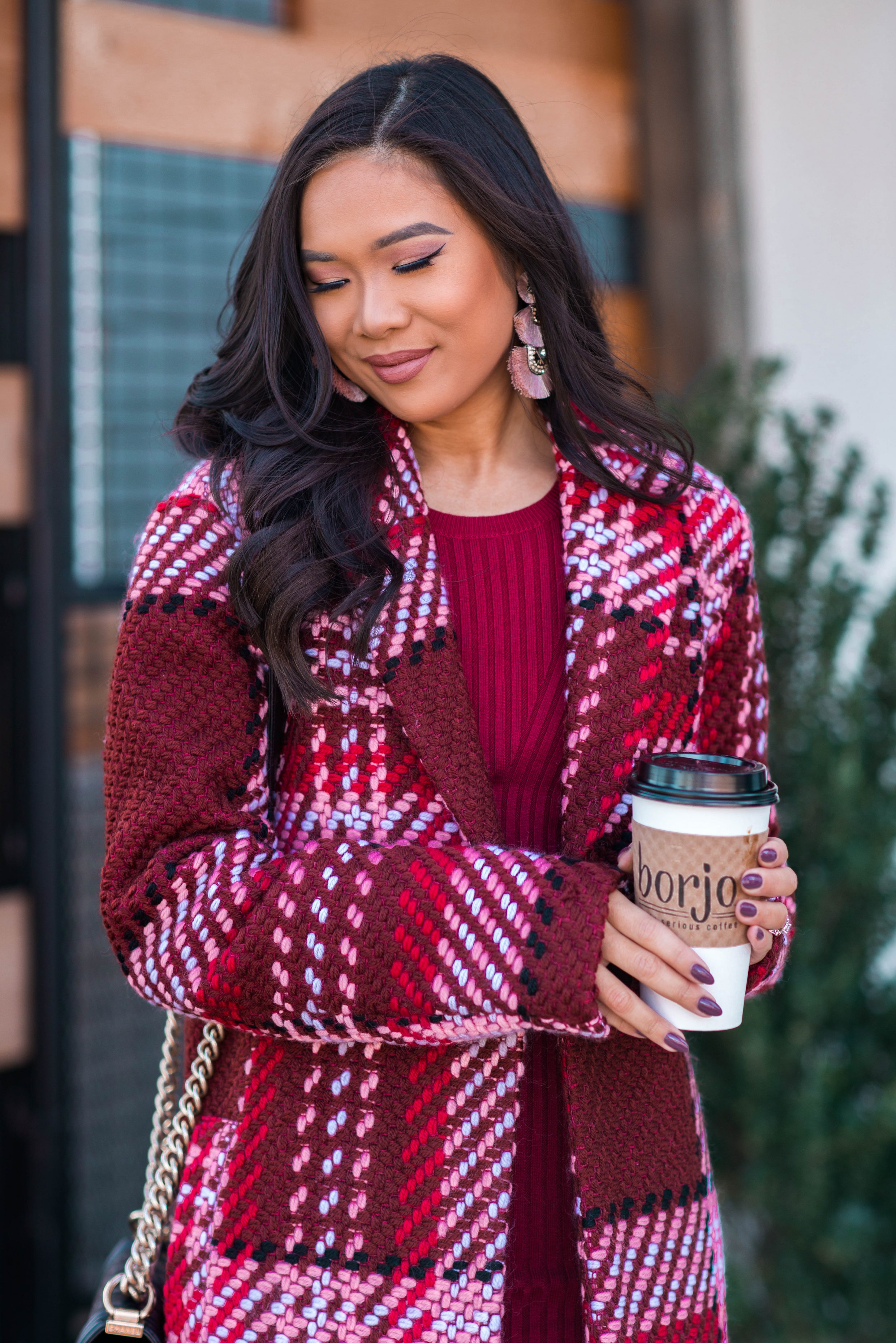 Blogger Hoang-Kim of ColorandChic.com styles a plaid statement coat for fall and winter