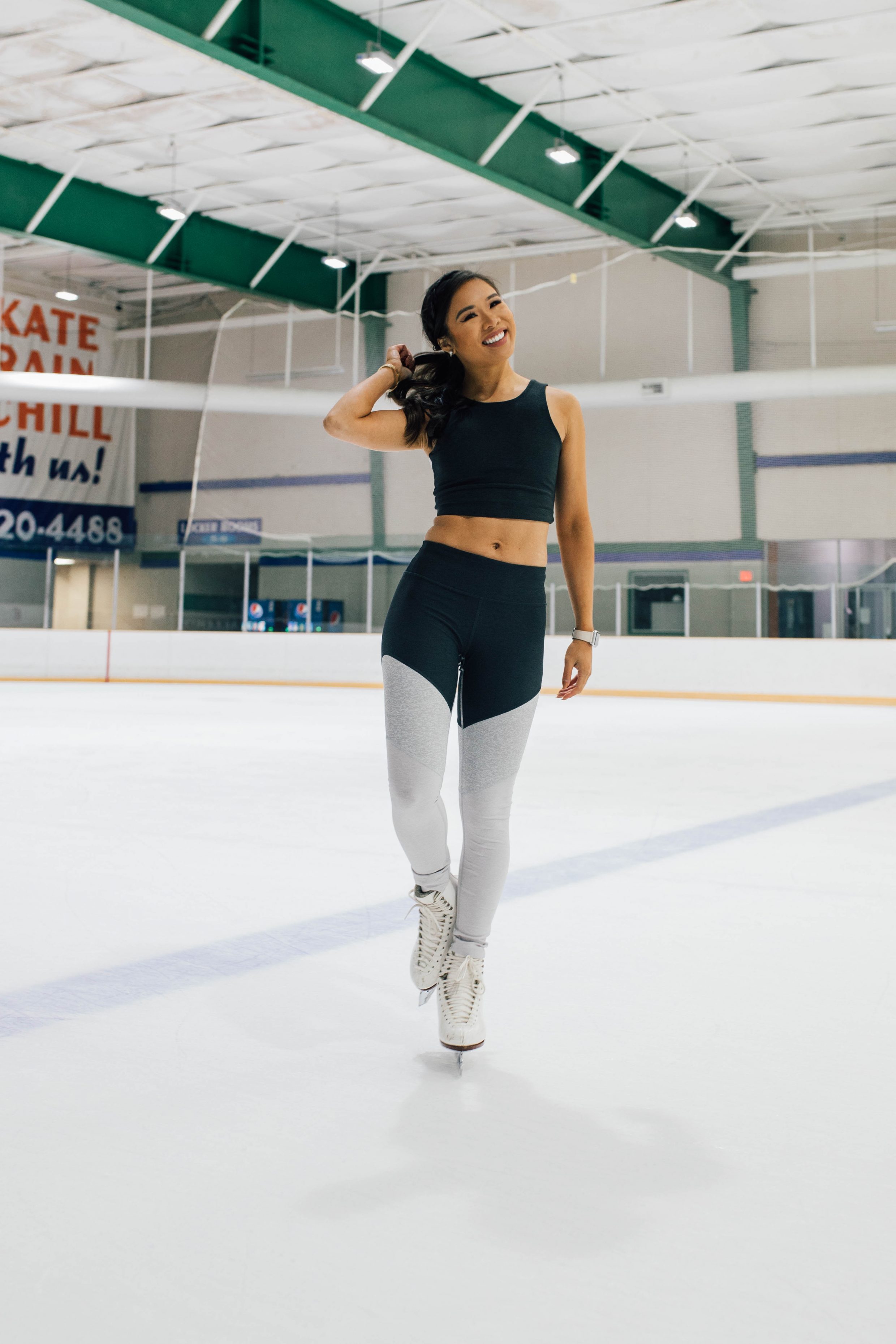 Hoang-Kim goes figure skating wearing Outdoor Voices athletic apparel