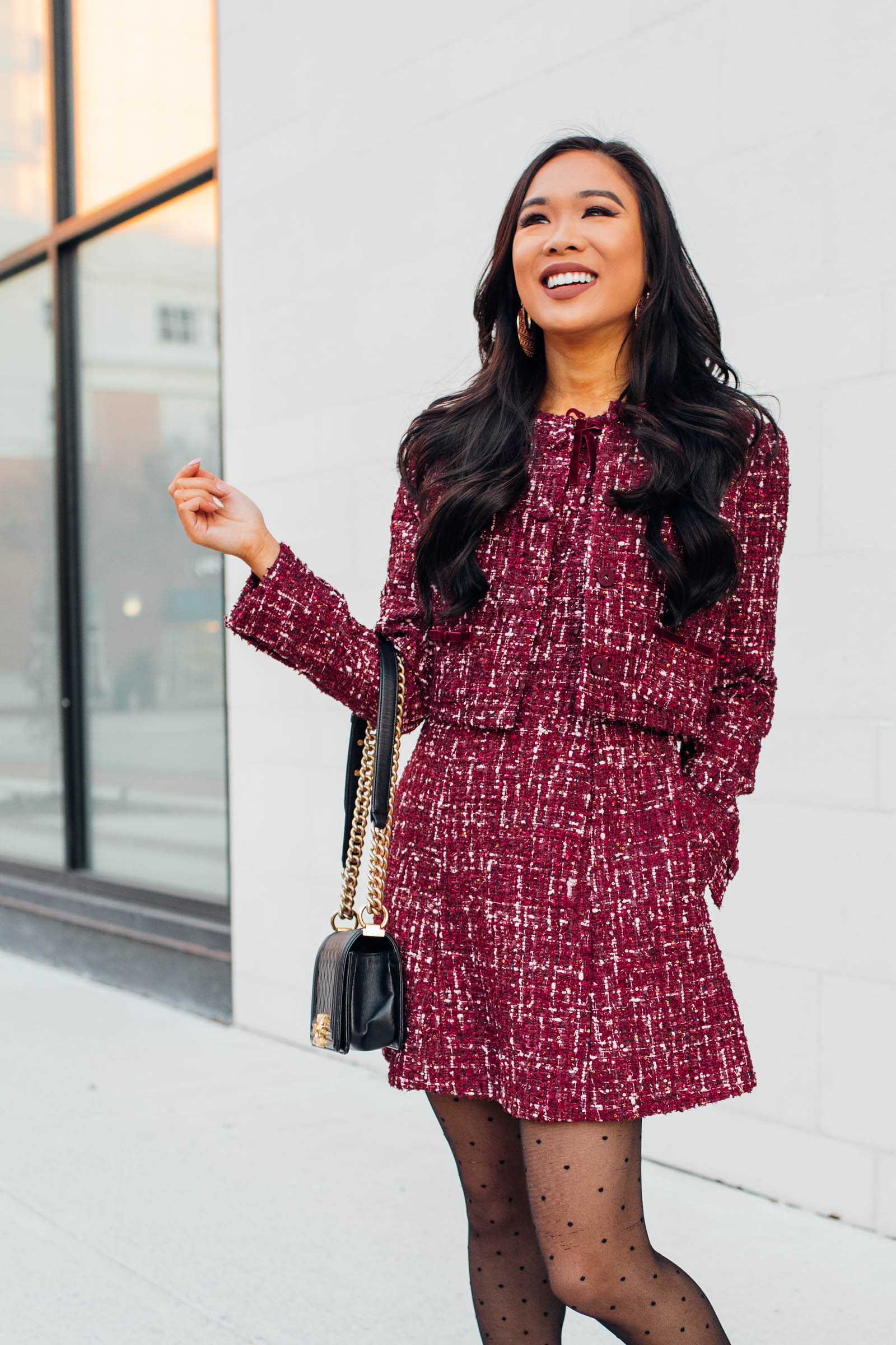 Blogger Hoang-Kim wearing a tweed two piece set for a holiday party 