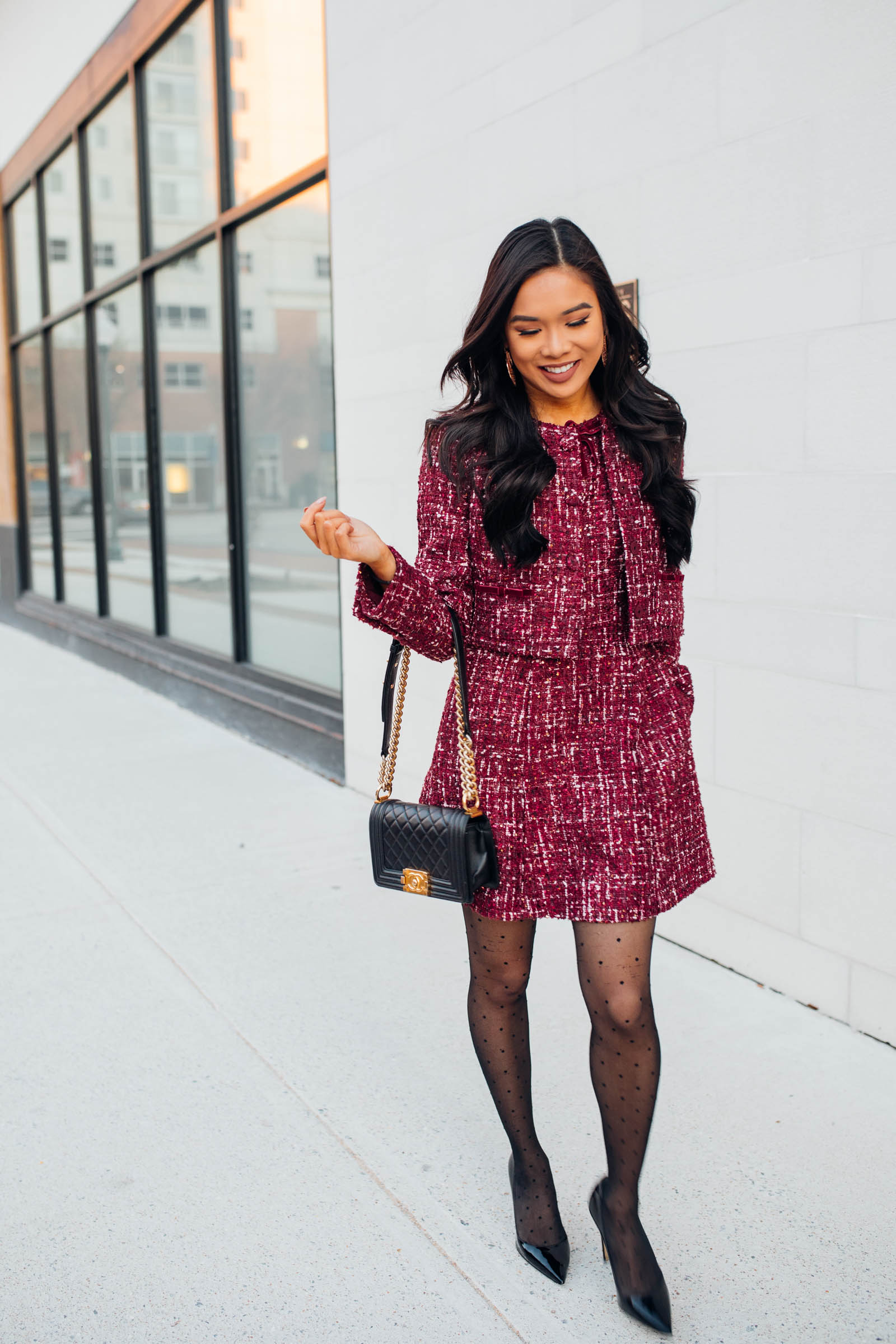Blogger Hoang-Kim wears a tweed two piece outfit for a holiday party