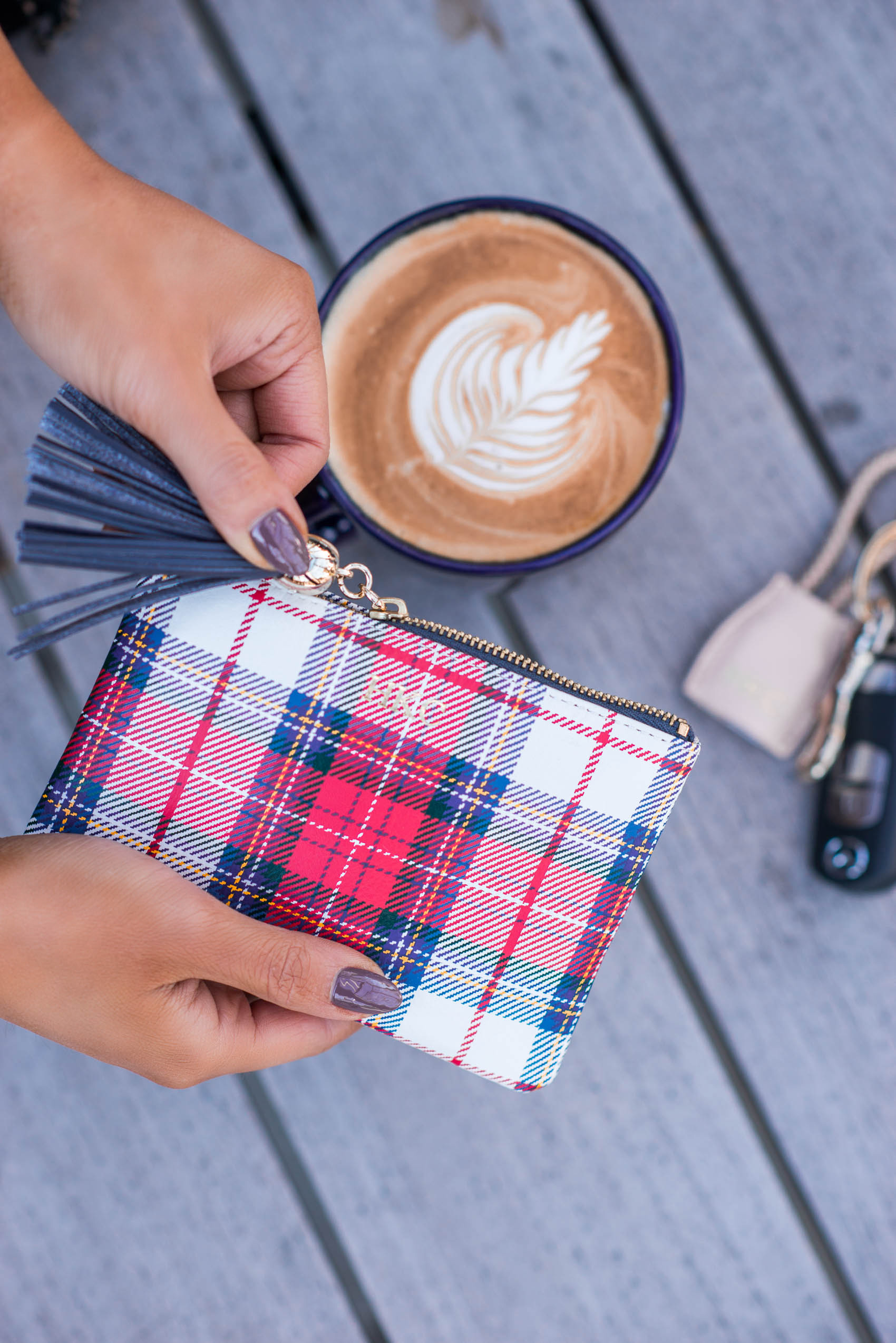 Hoang-Kim shares a plaid leather pouch from Mark & Graham as a practical gift to give