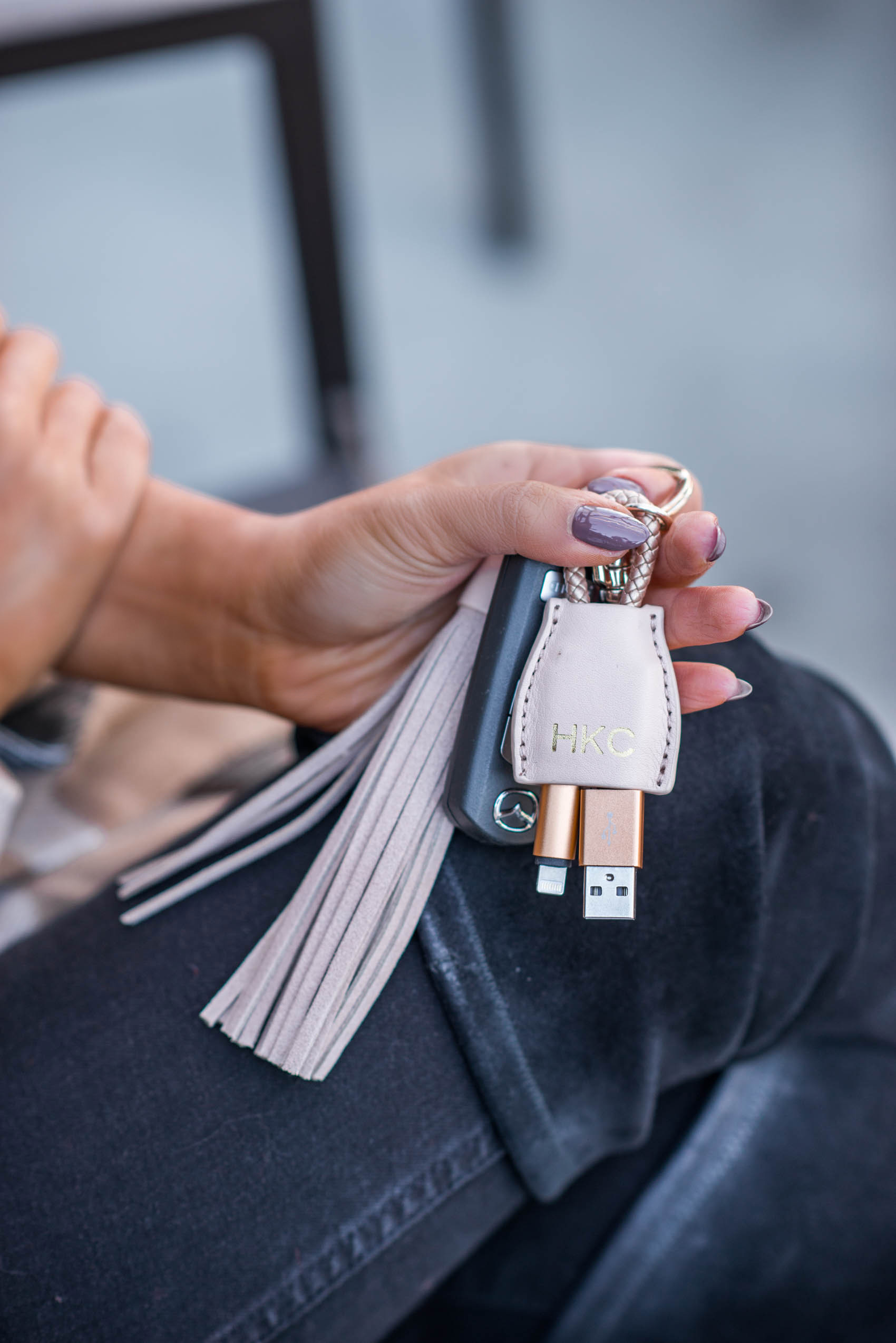 Hoang-Kim using a power-up tassel keychain from Mark & Graham as a practical gift to give this Christmas