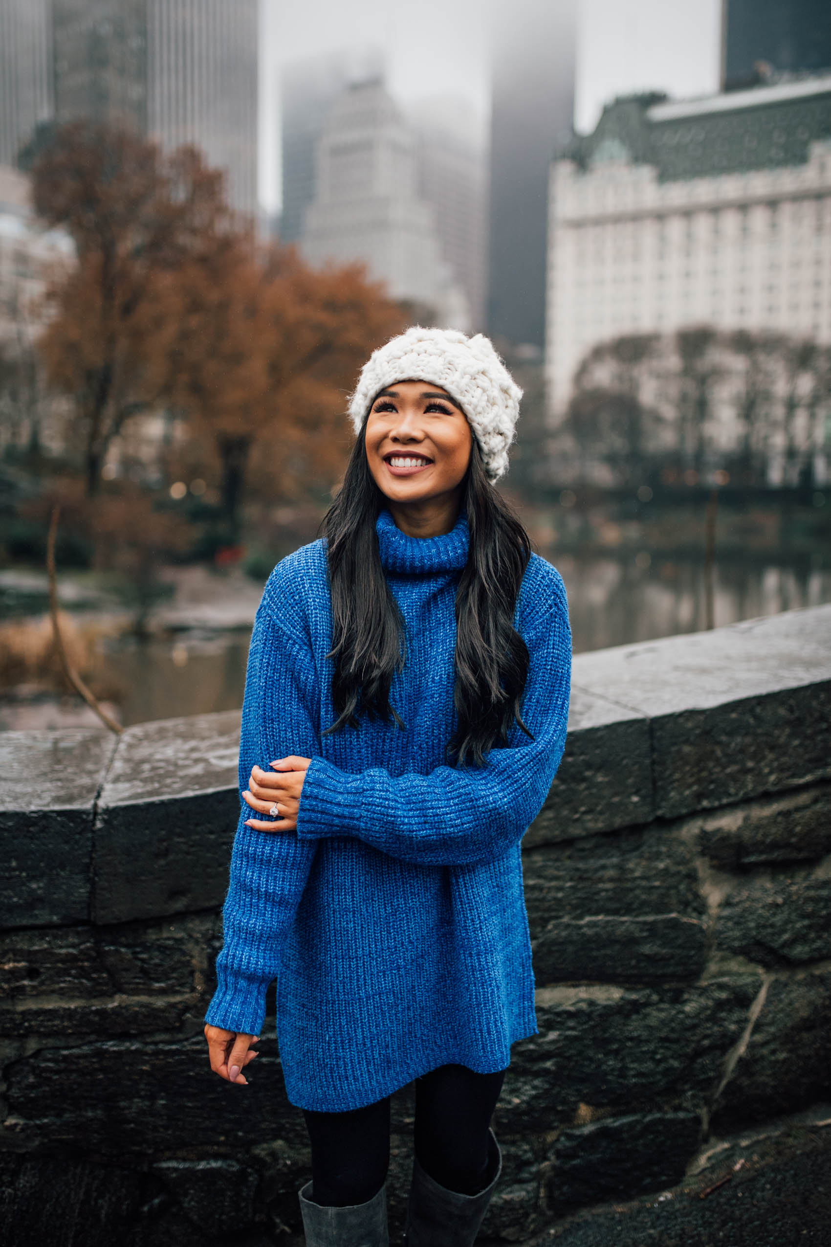 Blogger Hoang-Kim wears a cozy knit tunic with a chunky knit beanie 