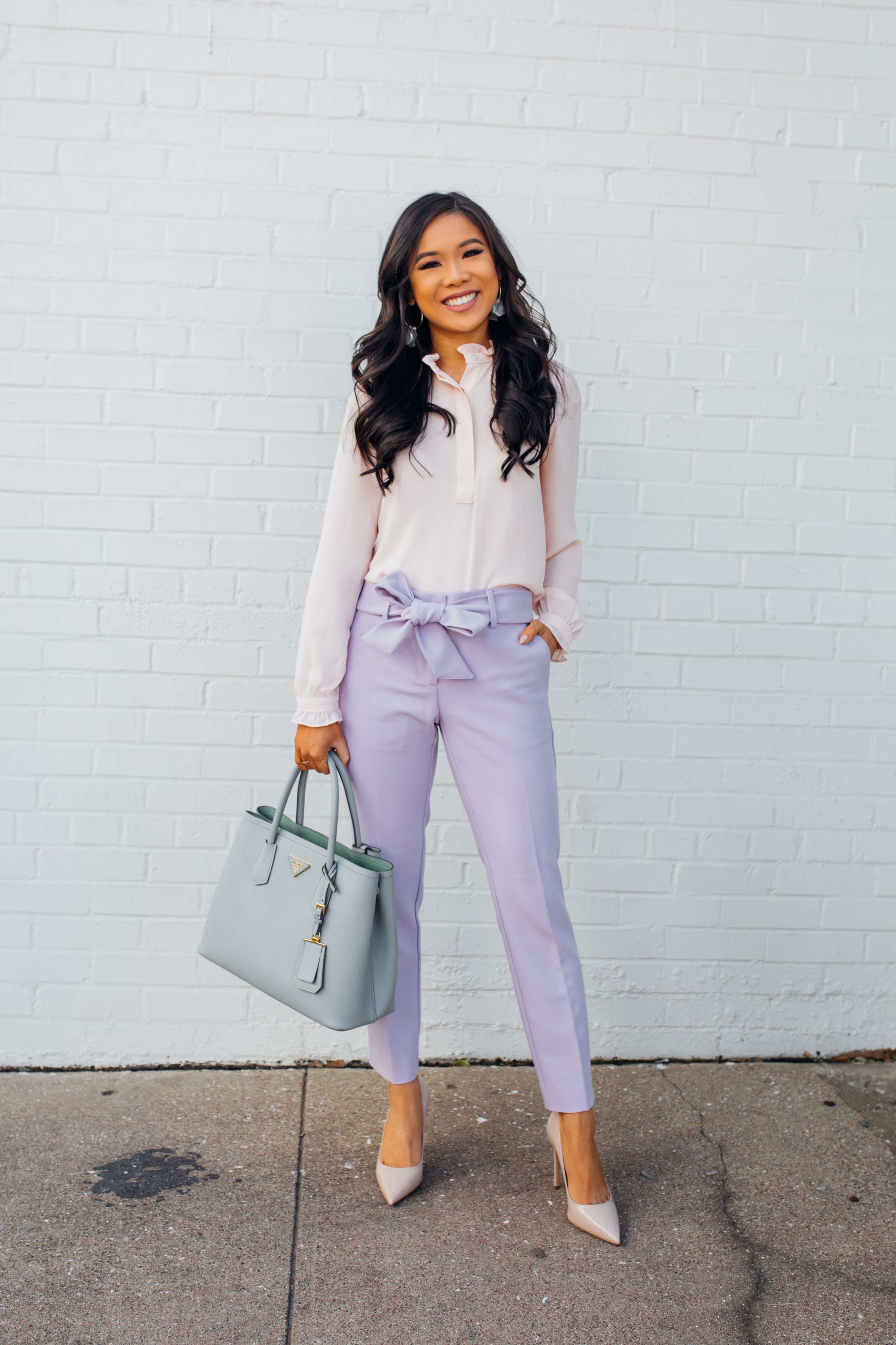 Blogger Hoang-Kim wears a pair of lavender tie-waist pants for spring