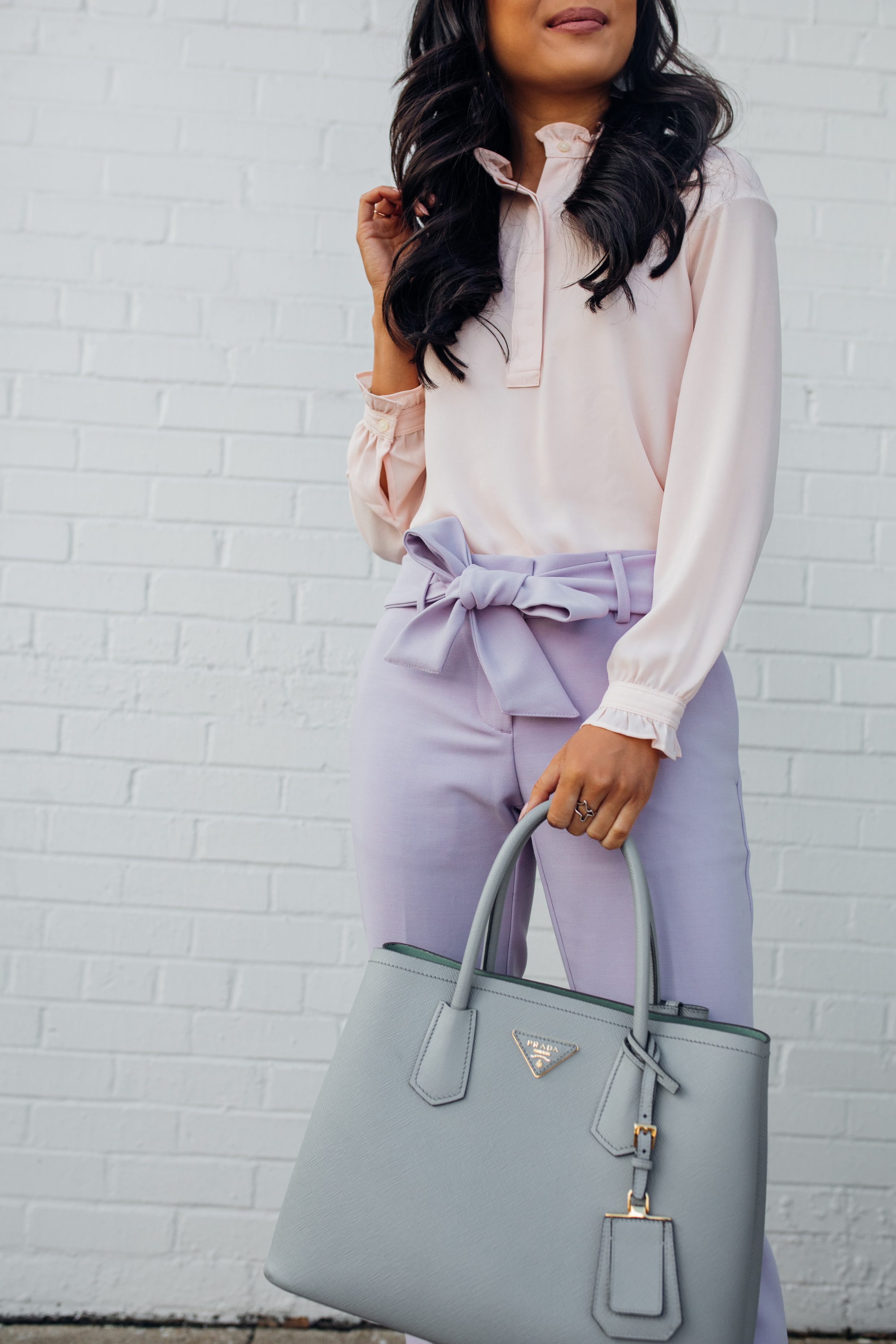 Petite blogger Hoang-Kim wears a blush henley with lavender tie-waist pants from LOFT