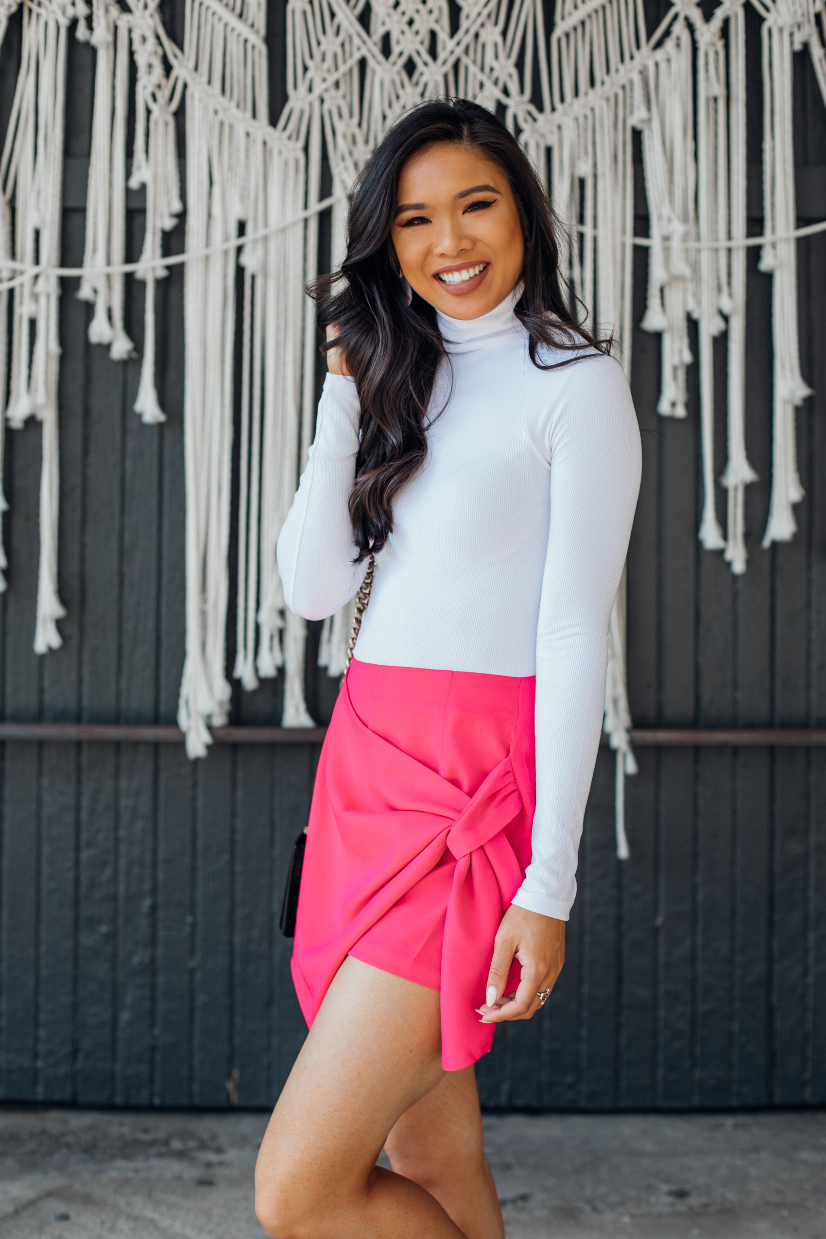 Blogger Hoang-Kim shares a Valentine's Day outfit idea featuring a pink skort