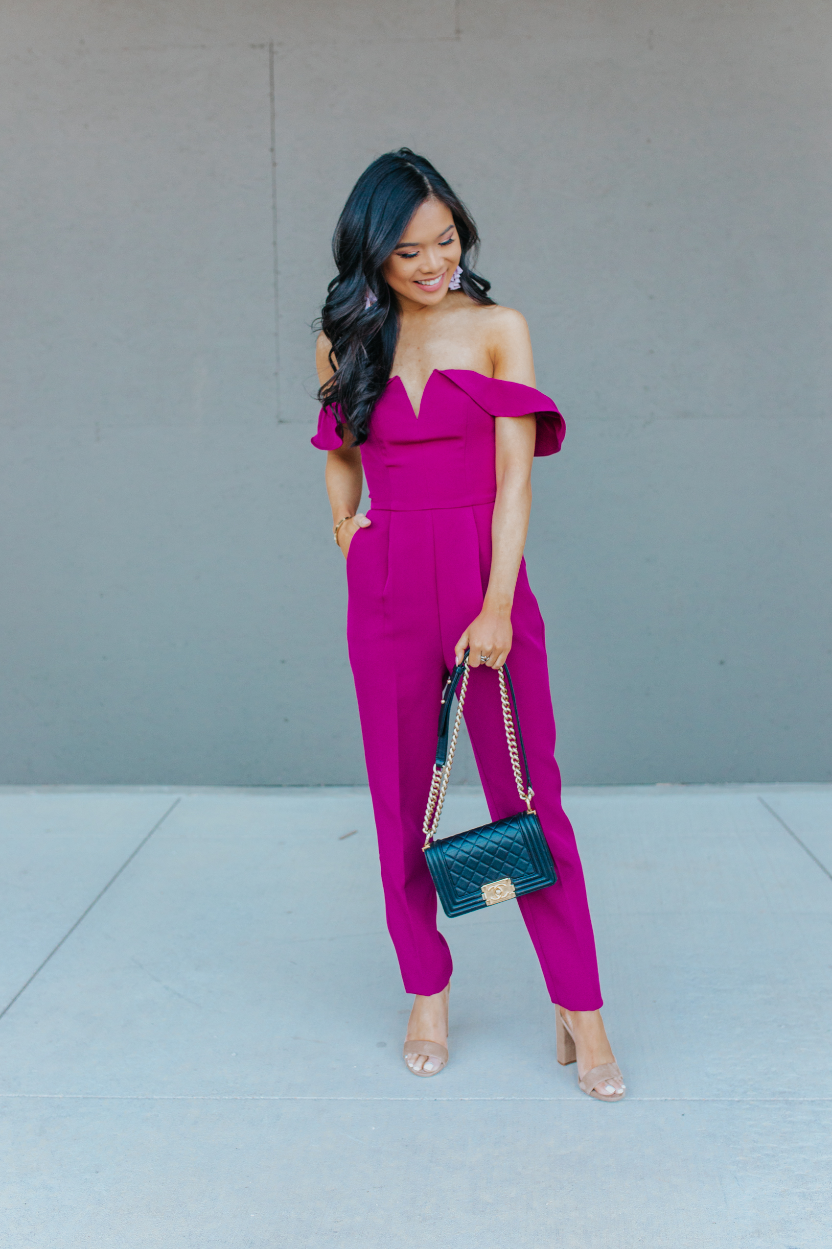 An off the shoulder jumpsuit you can wear as a wedding guest